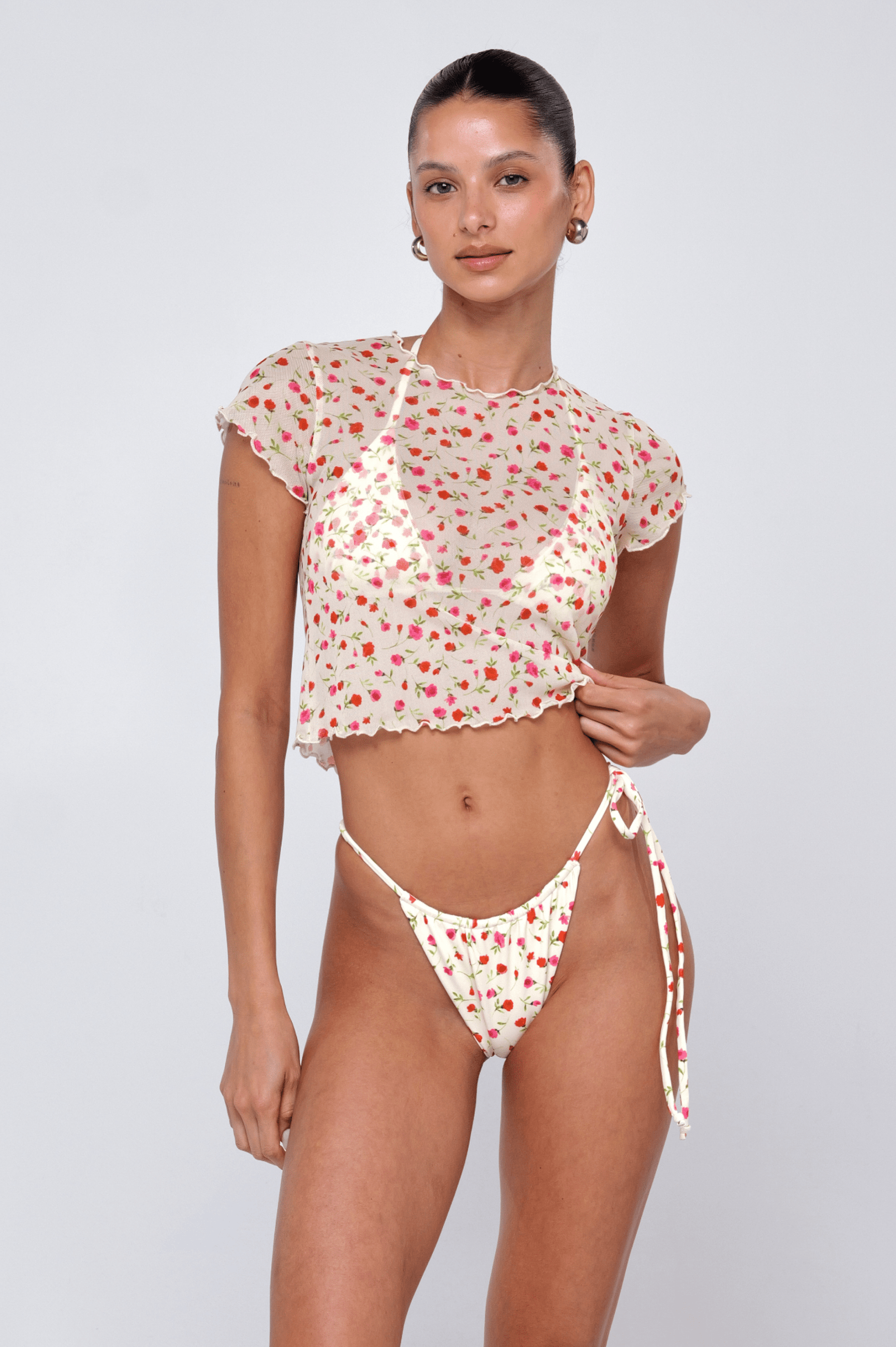 This is an image of Baby Tee in Buttercream - RESA featuring a model wearing the dress