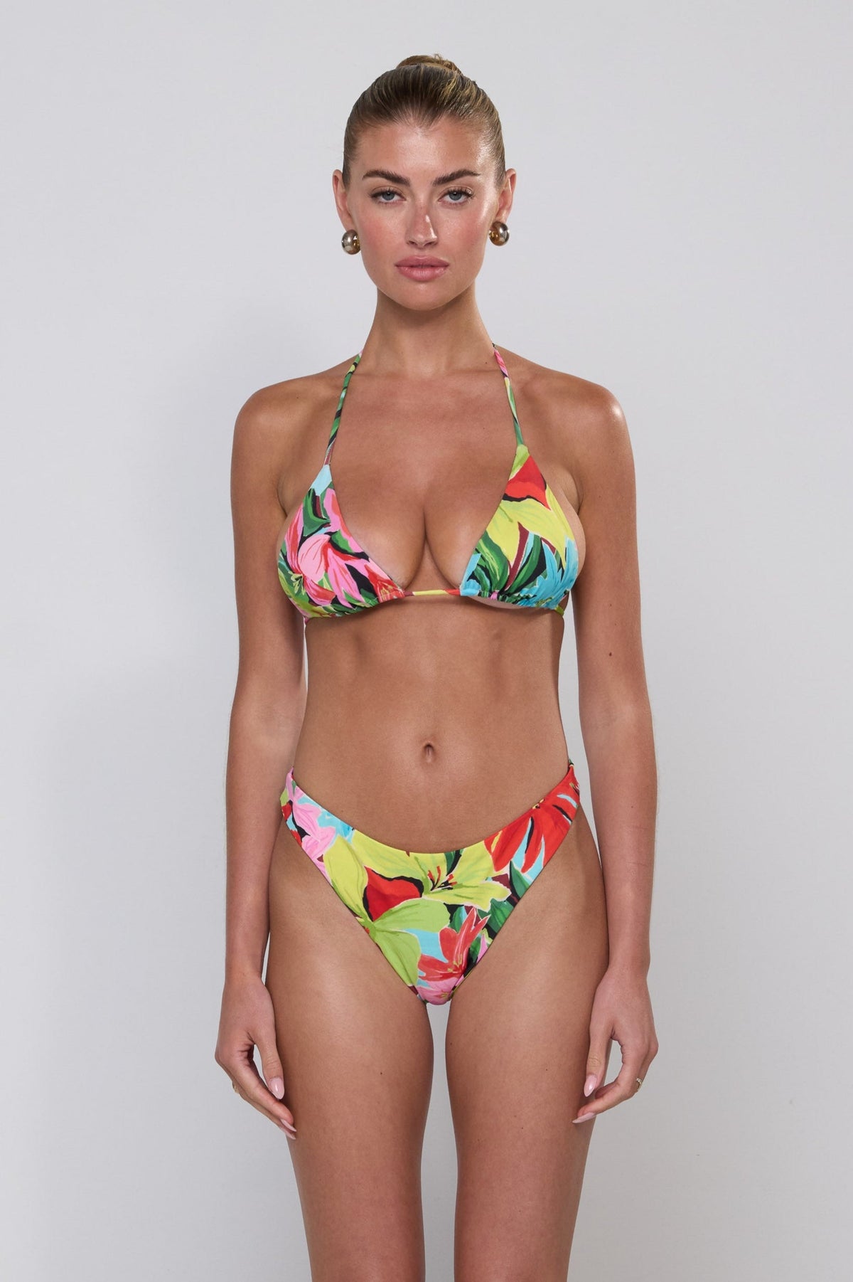 This is an image of Beau Bikini Bottom in Tropicana - RESA featuring a model wearing the dress