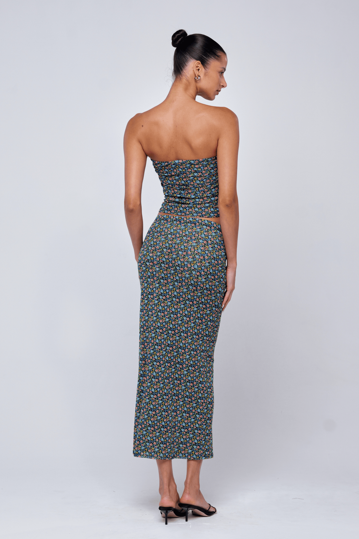 This is an image of Bonnie Mesh Top in Paros - RESA featuring a model wearing the dress