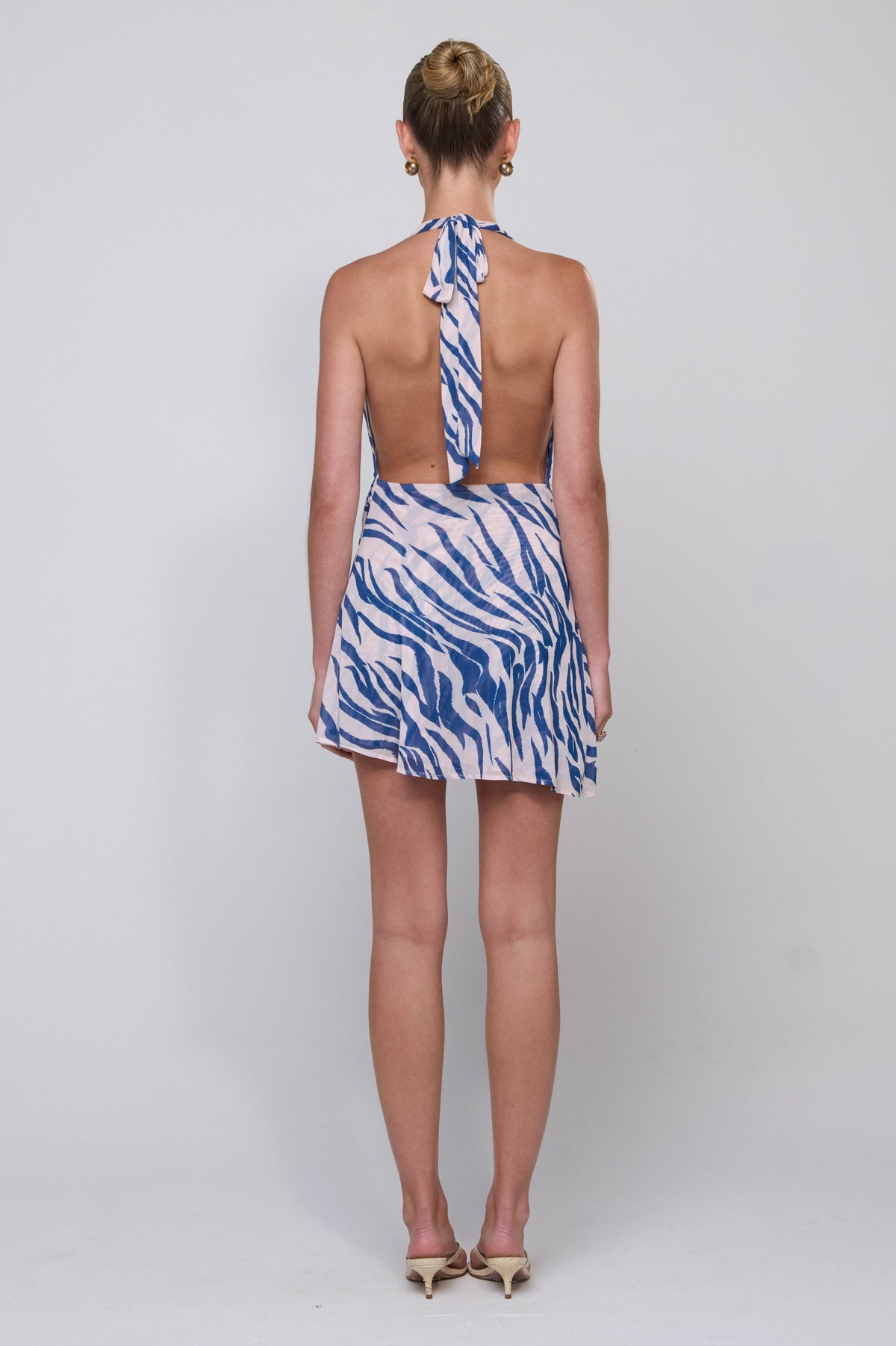 This is an image of Bruna Dress in Athens - RESA featuring a model wearing the dress