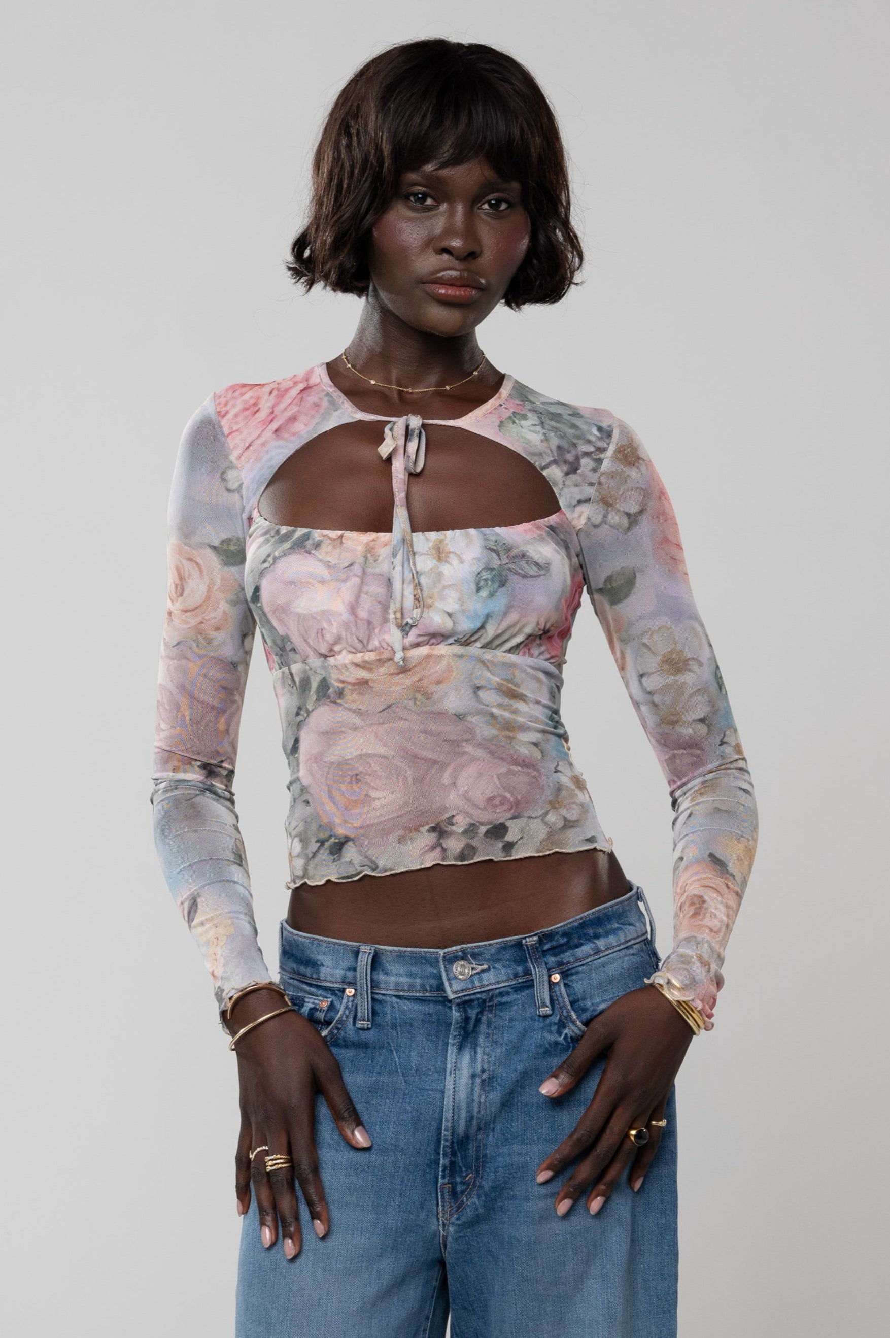 This is an image of Cassie Top in Damsel - RESA featuring a model wearing the dress