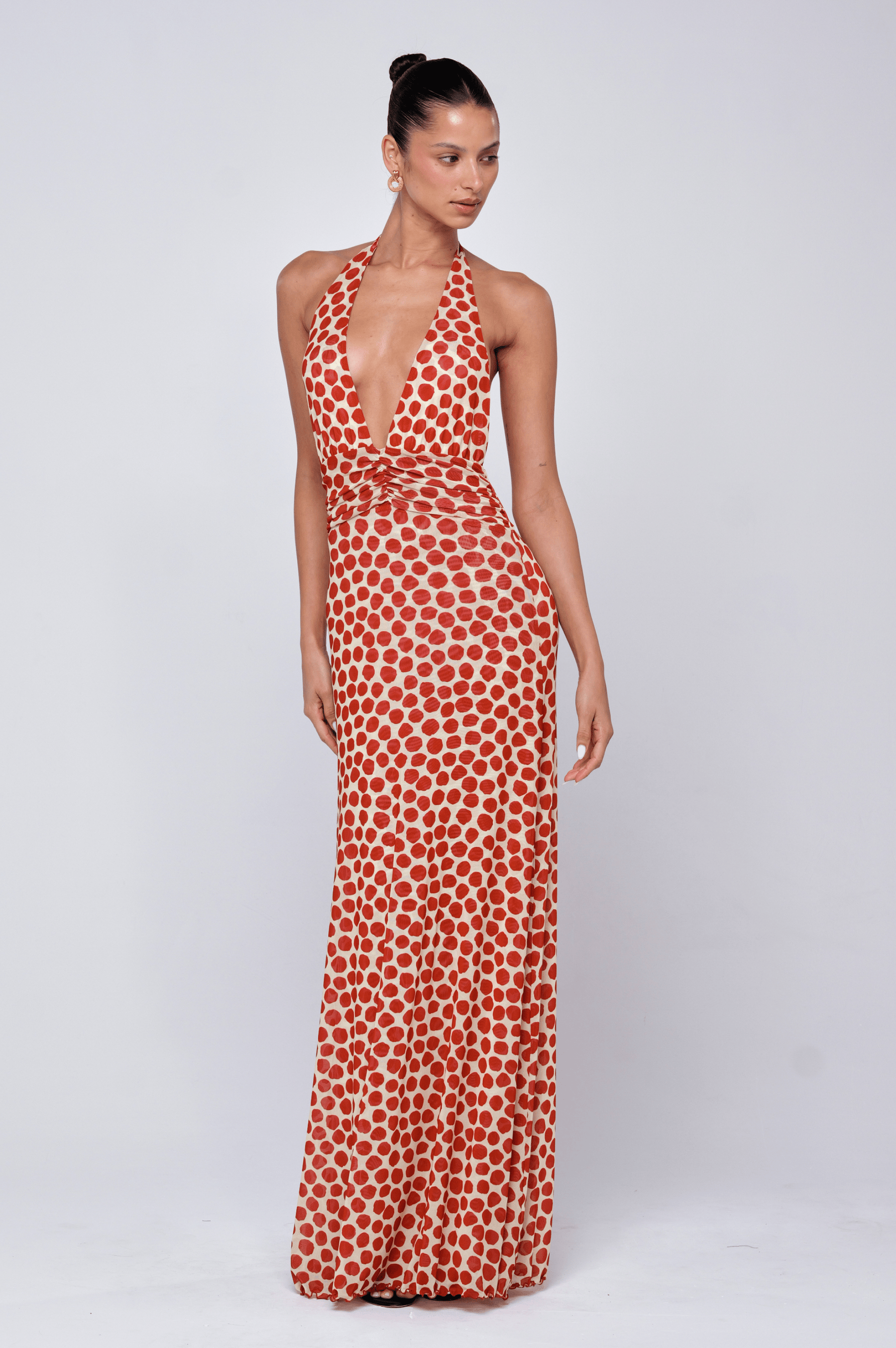 This is an image of Chelsea Dress in Campari - RESA featuring a model wearing the dress