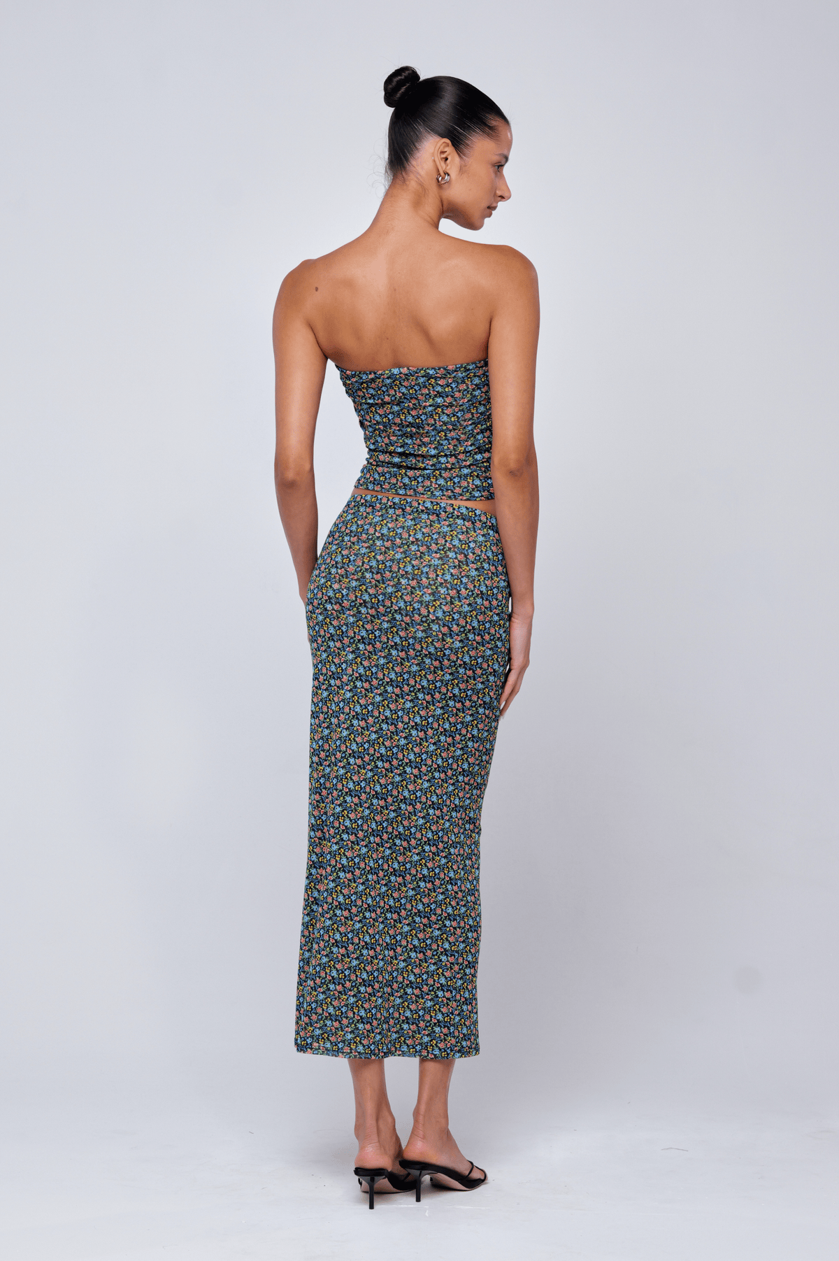This is an image of Clyde Mesh Skirt in Paros - RESA featuring a model wearing the dress