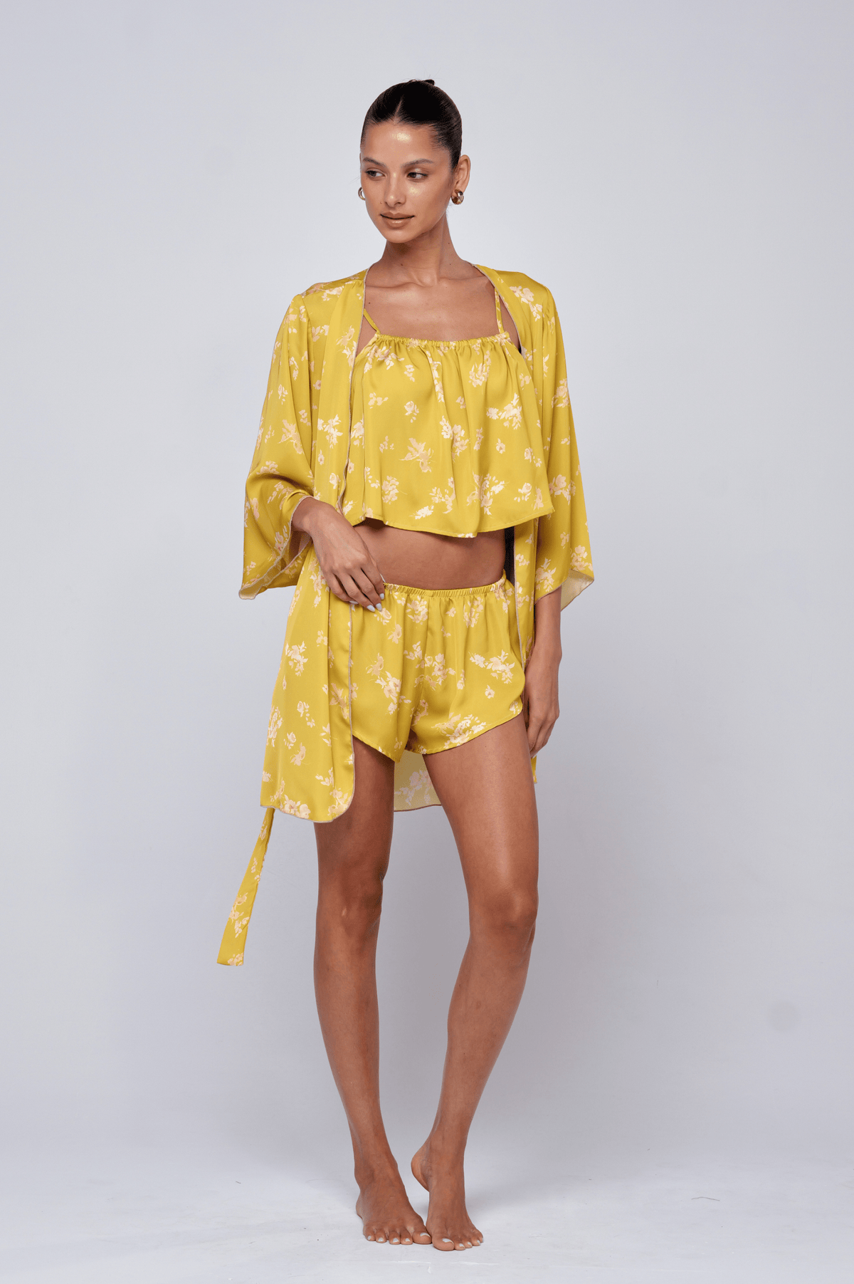 This is an image of Ellie Set in Citrus - RESA featuring a model wearing the dress