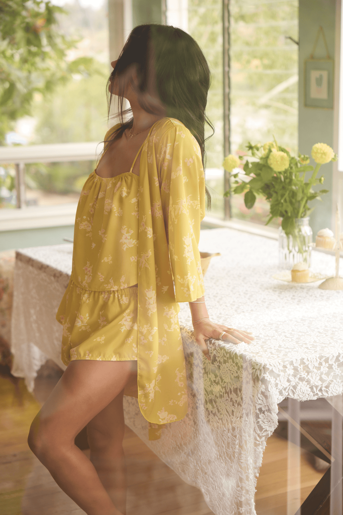 This is an image of Ellie Set in Citrus - RESA featuring a model wearing the dress