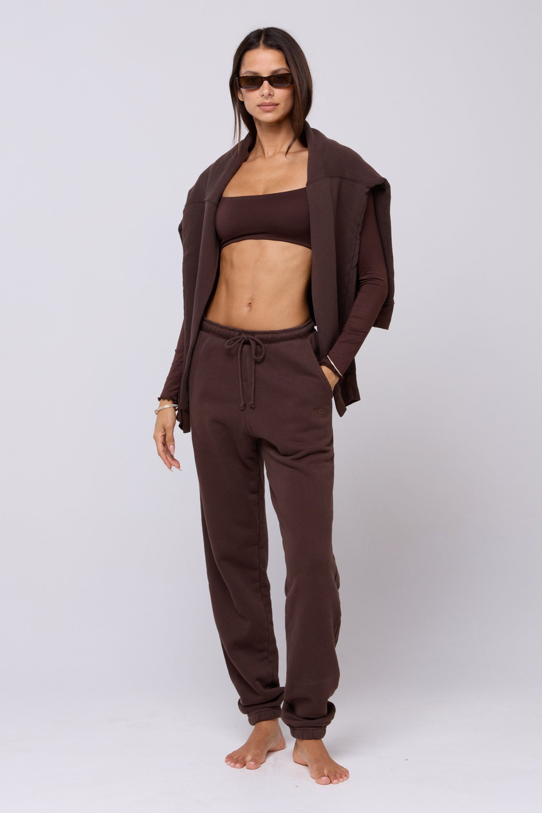 This is an image of Emily Top in Chocolate - RESA featuring a model wearing the dress