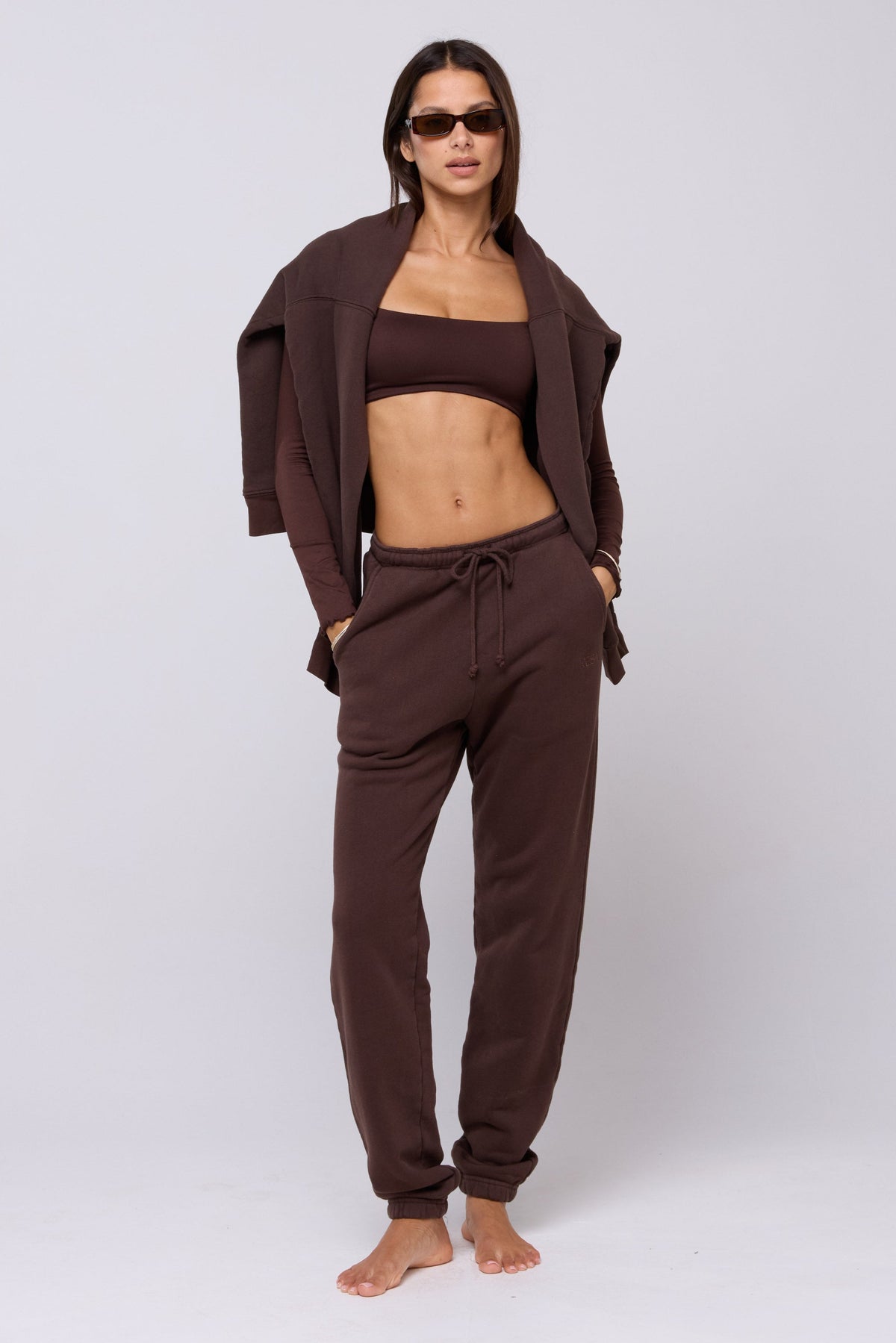 This is an image of Emily Top in Chocolate - RESA featuring a model wearing the dress