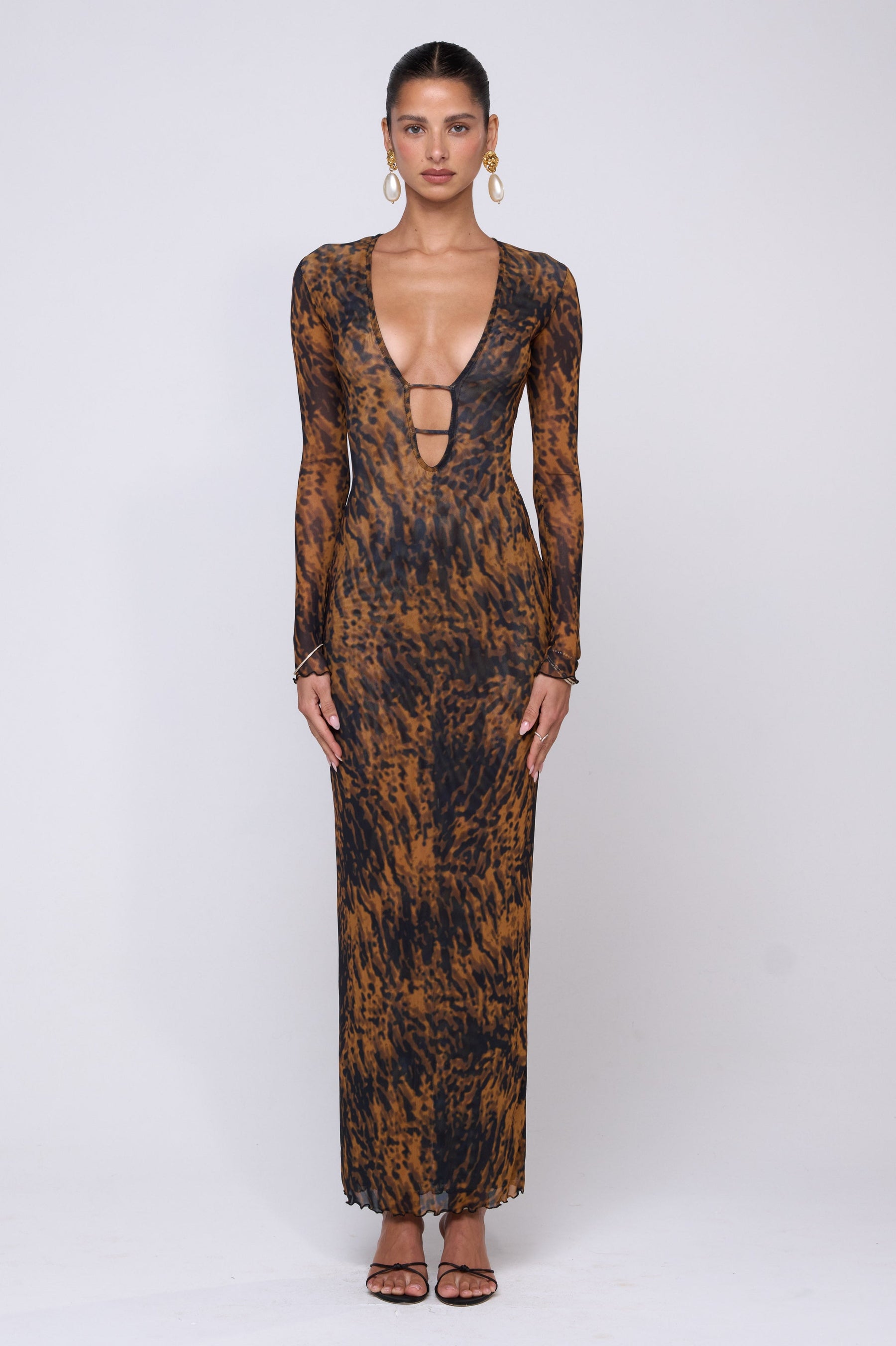 This is an image of Esme Dress in Bond - RESA featuring a model wearing the dress