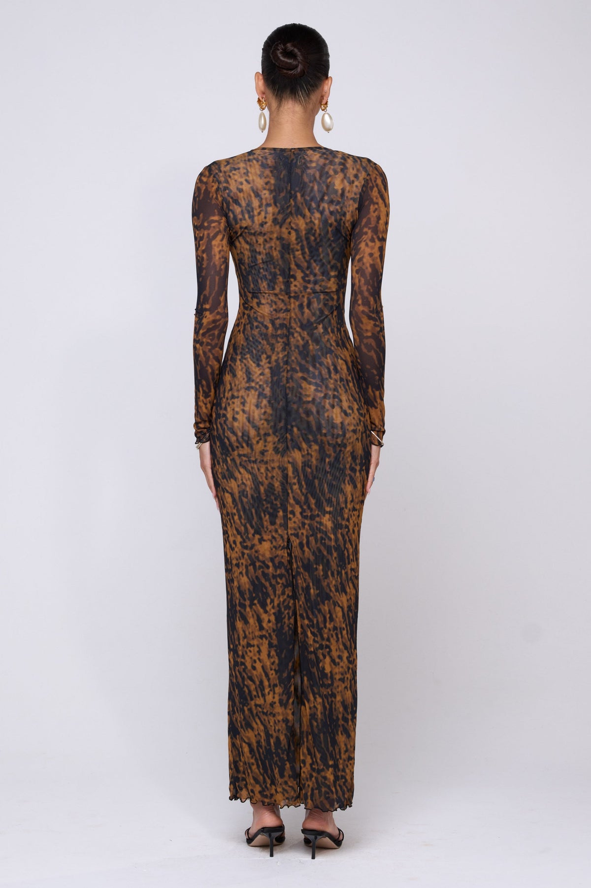 This is an image of Esme Dress in Bond - RESA featuring a model wearing the dress