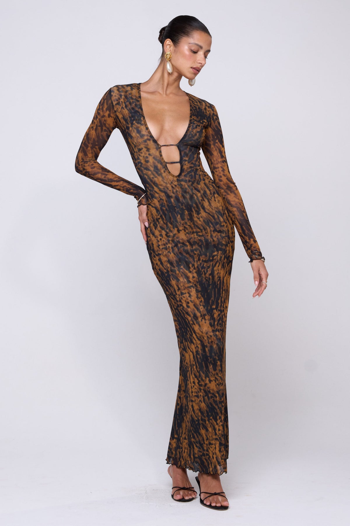 This is an image of Esme Dress in Bond - RESA featuring a model wearing the dress