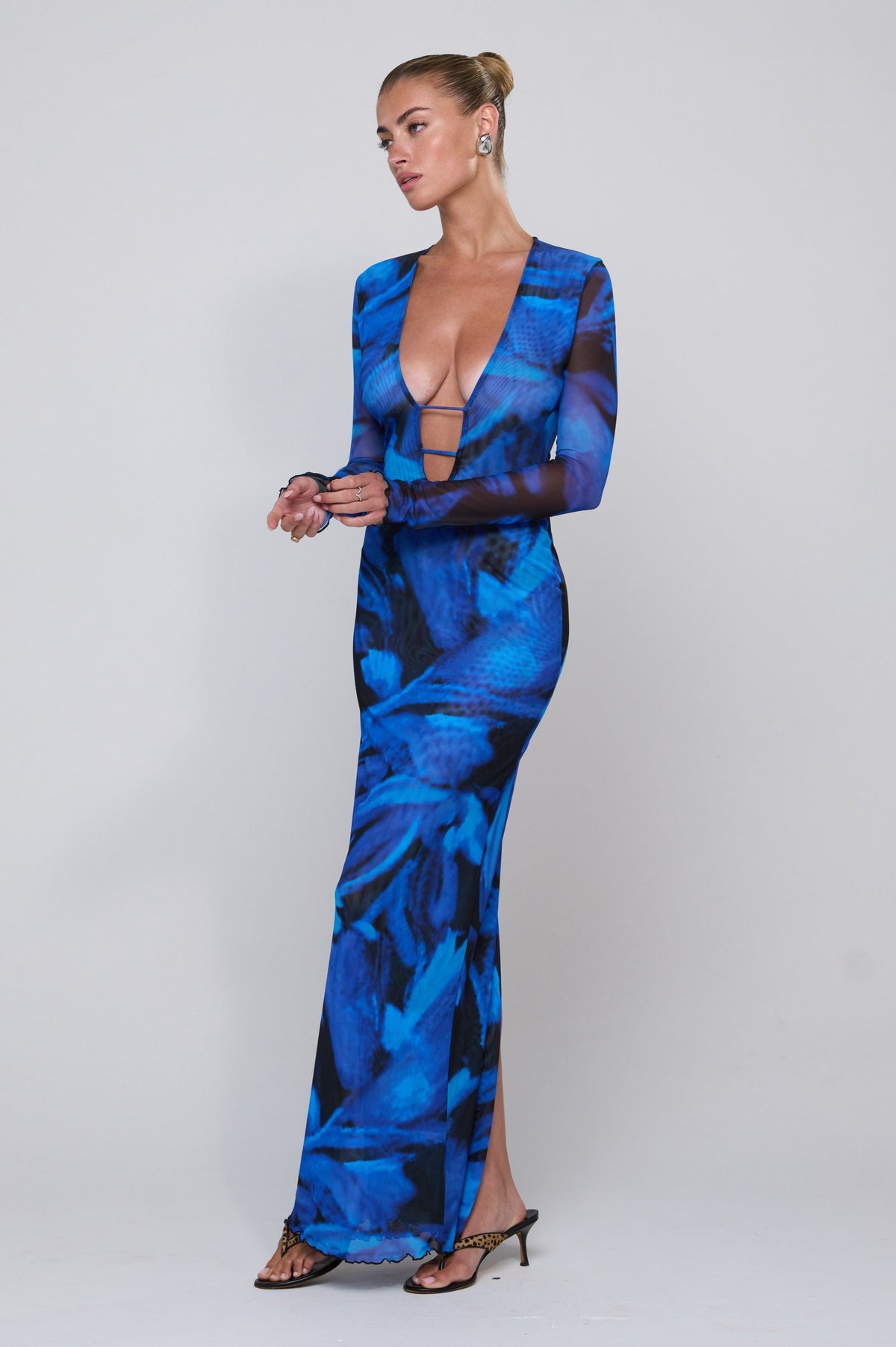 This is an image of Esme Dress in Lagoon - RESA featuring a model wearing the dress