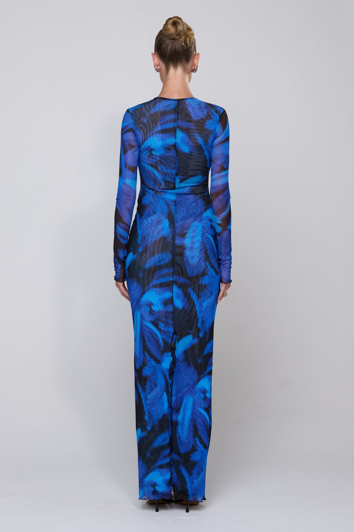 This is an image of Esme Dress in Lagoon - RESA featuring a model wearing the dress