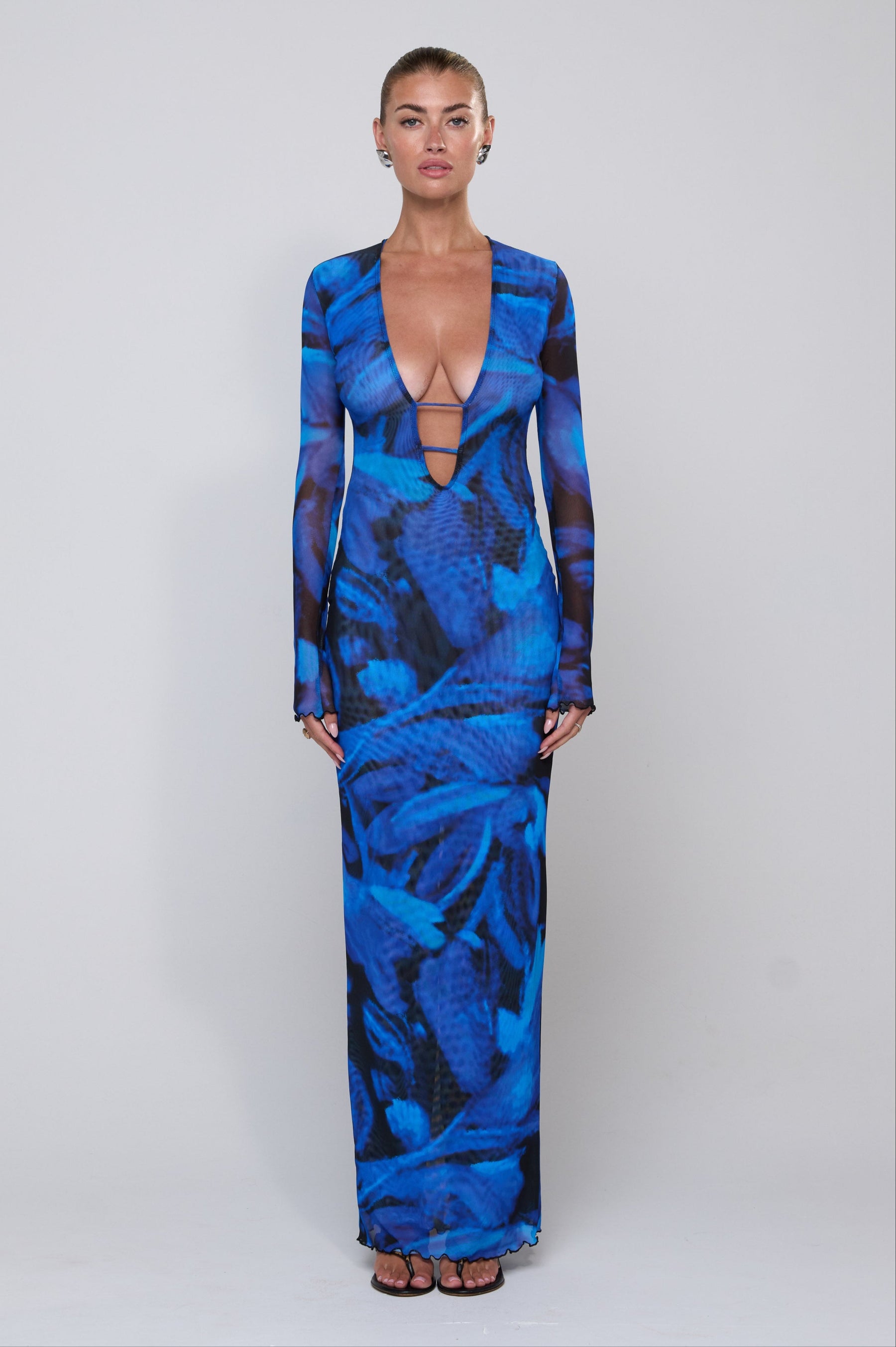 This is an image of Esme Dress in Lagoon - RESA featuring a model wearing the dress