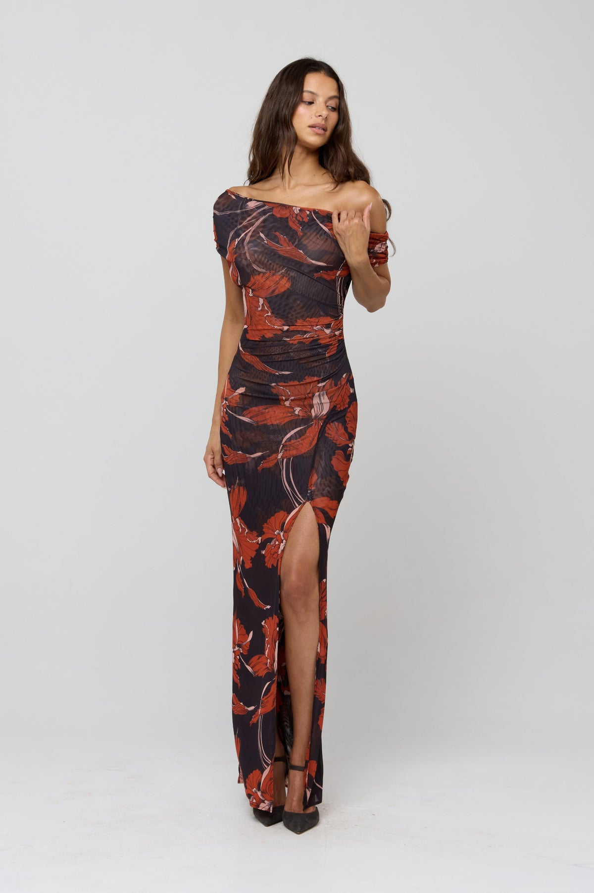 This is an image of Gwen Dress in Coeur - RESA featuring a model wearing the dress