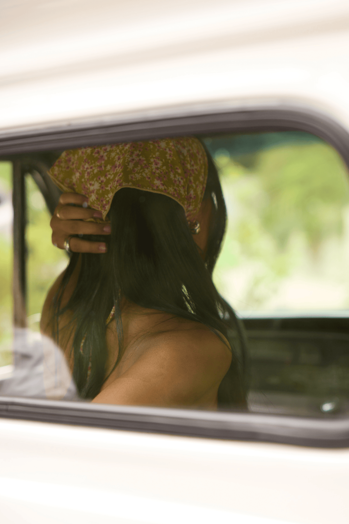 This is an image of Head scarf in Matcha - RESA featuring a model wearing the dress