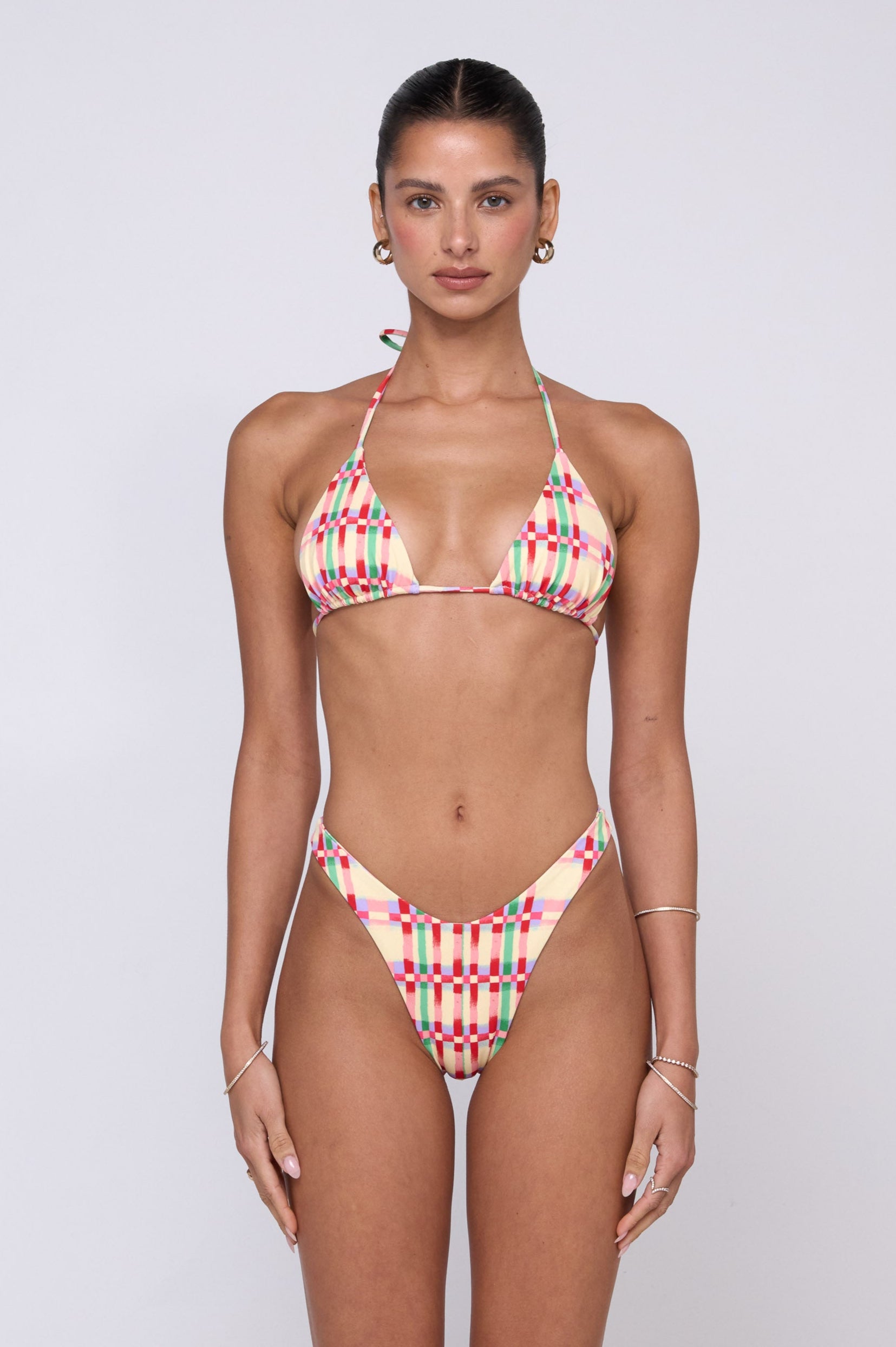 This is an image of Joey Bikini Bottom in Plaid - RESA featuring a model wearing the dress