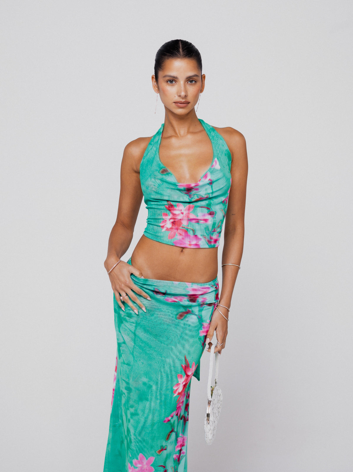 This is an image of Lea Top in Clearwater - RESA featuring a model wearing the dress