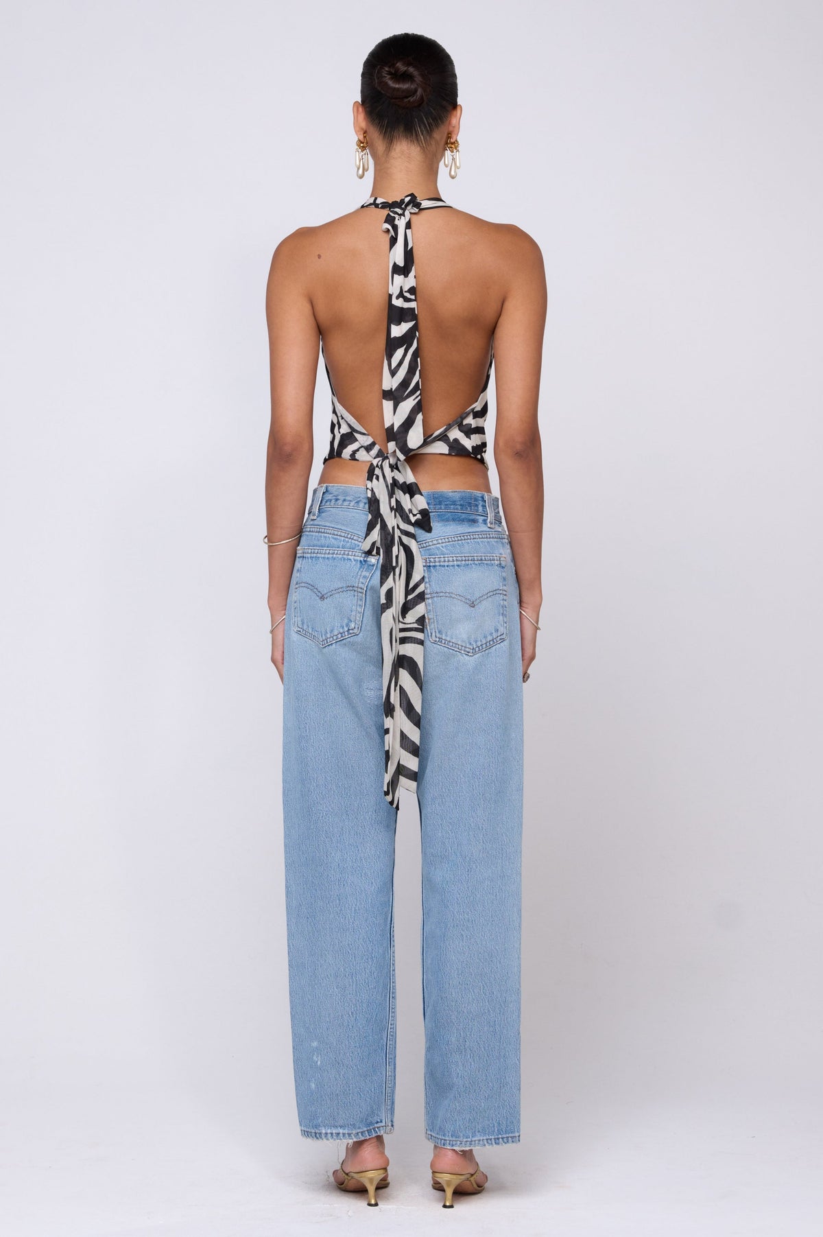 This is an image of Lea Top in Tigris - RESA featuring a model wearing the dress