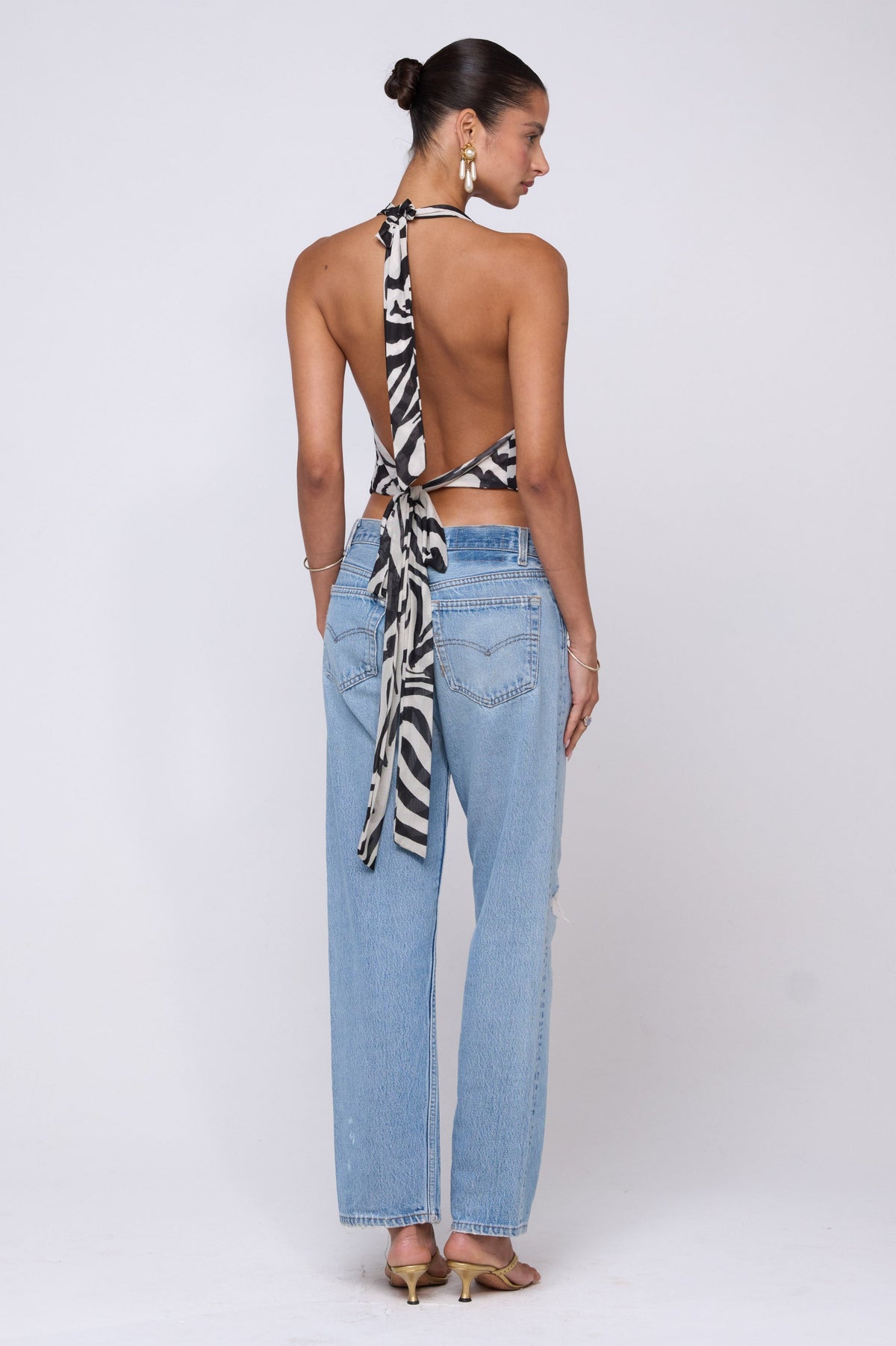 This is an image of Lea Top in Tigris - RESA featuring a model wearing the dress