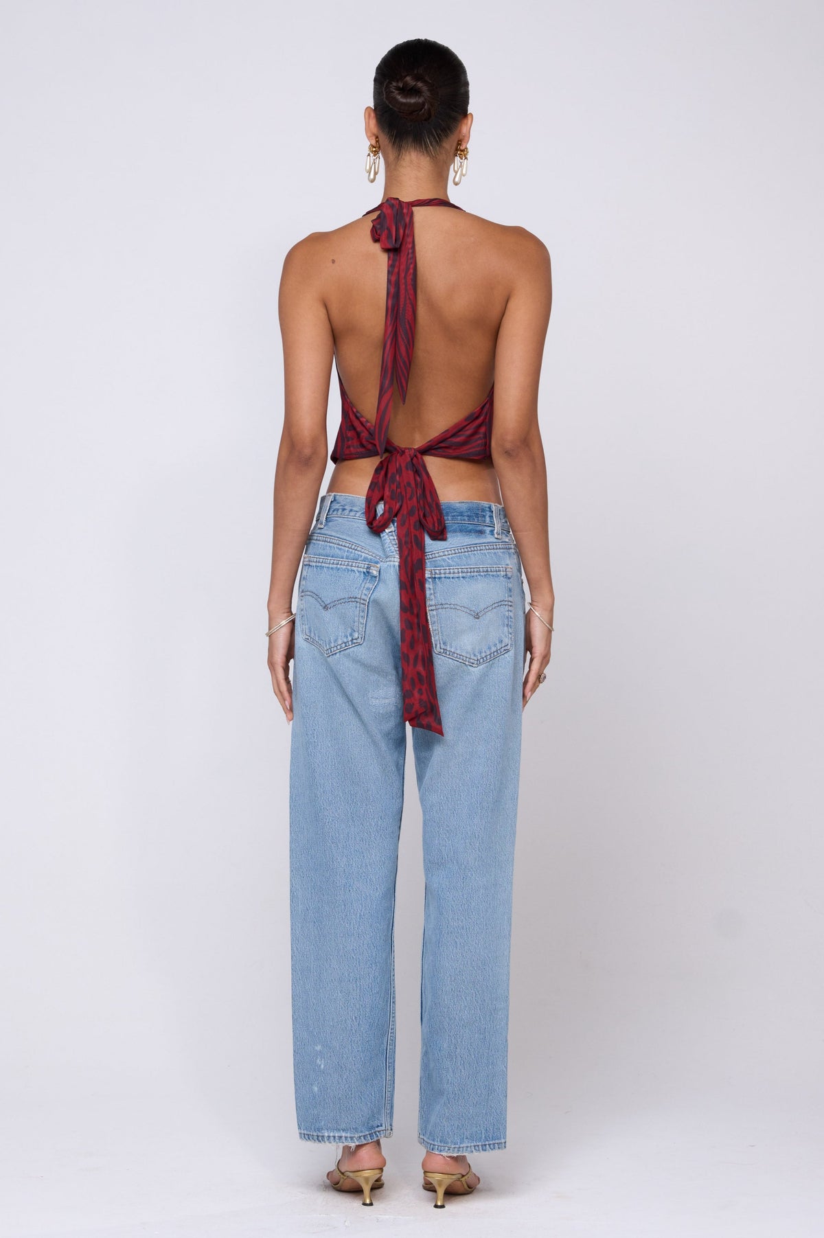 This is an image of Lea Top in Vixen - RESA featuring a model wearing the dress