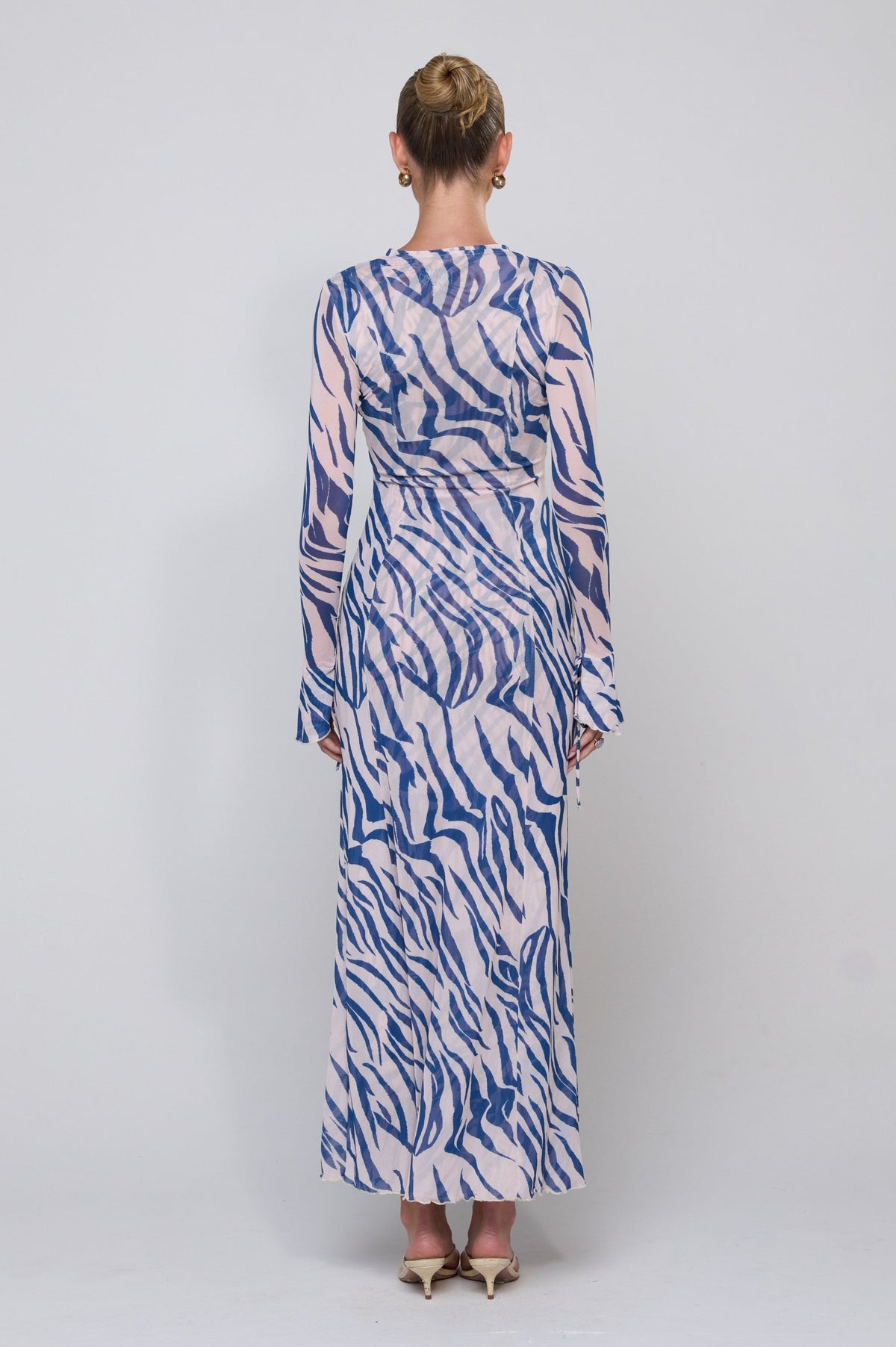 This is an image of Lennon Maxi in Athens - RESA featuring a model wearing the dress