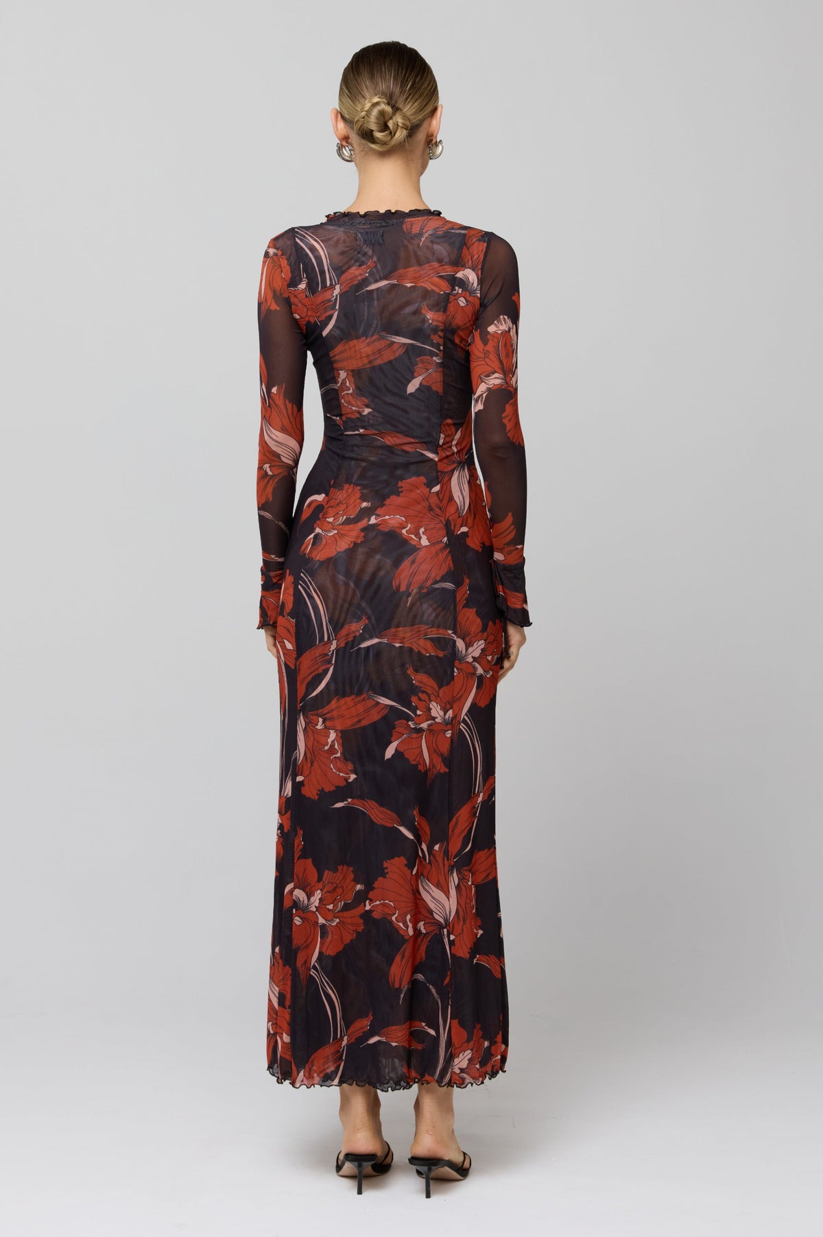 This is an image of Lennon Maxi in Coeur - RESA featuring a model wearing the dress