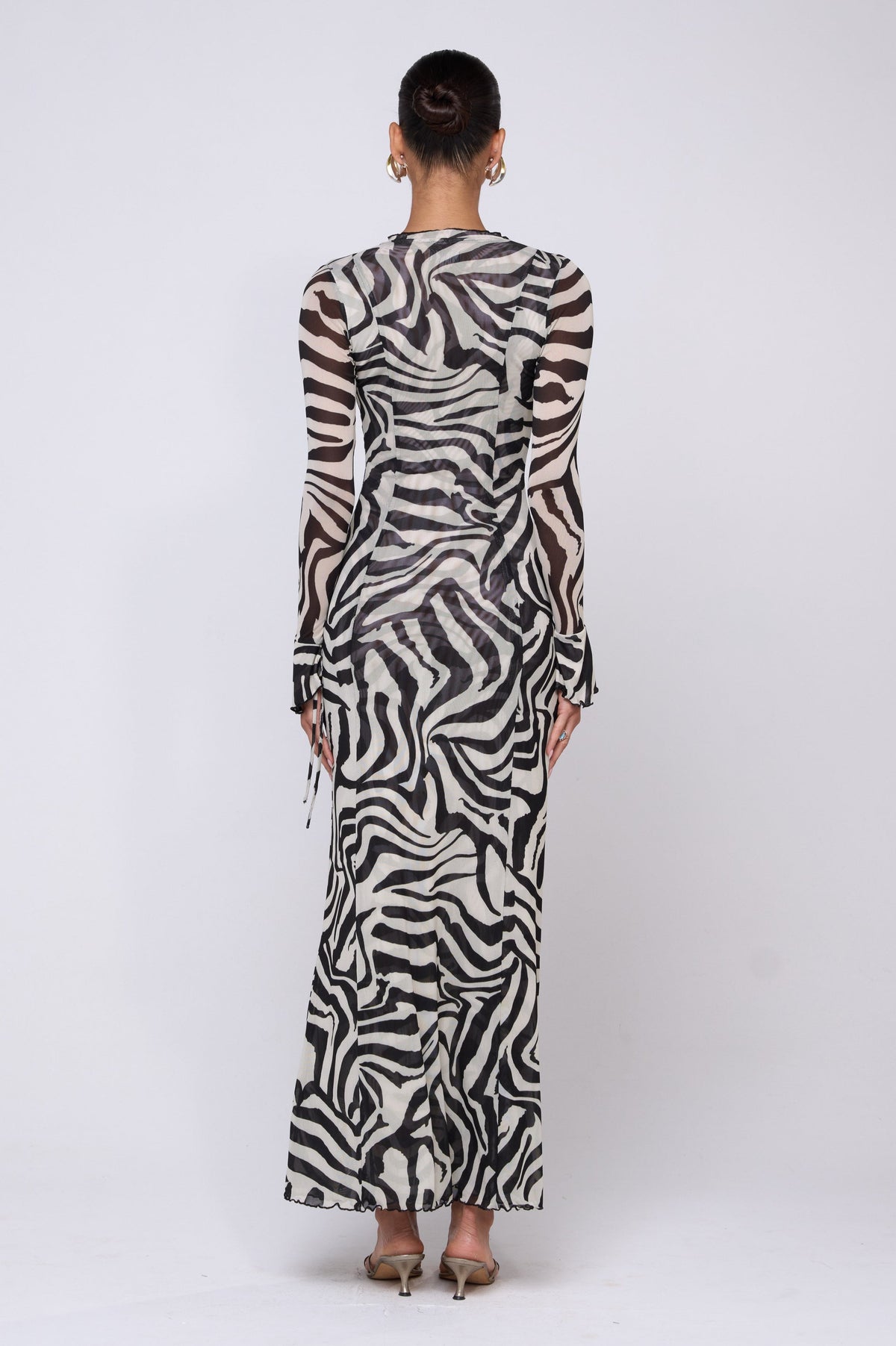 This is an image of Lennon Maxi in Tigris - RESA featuring a model wearing the dress