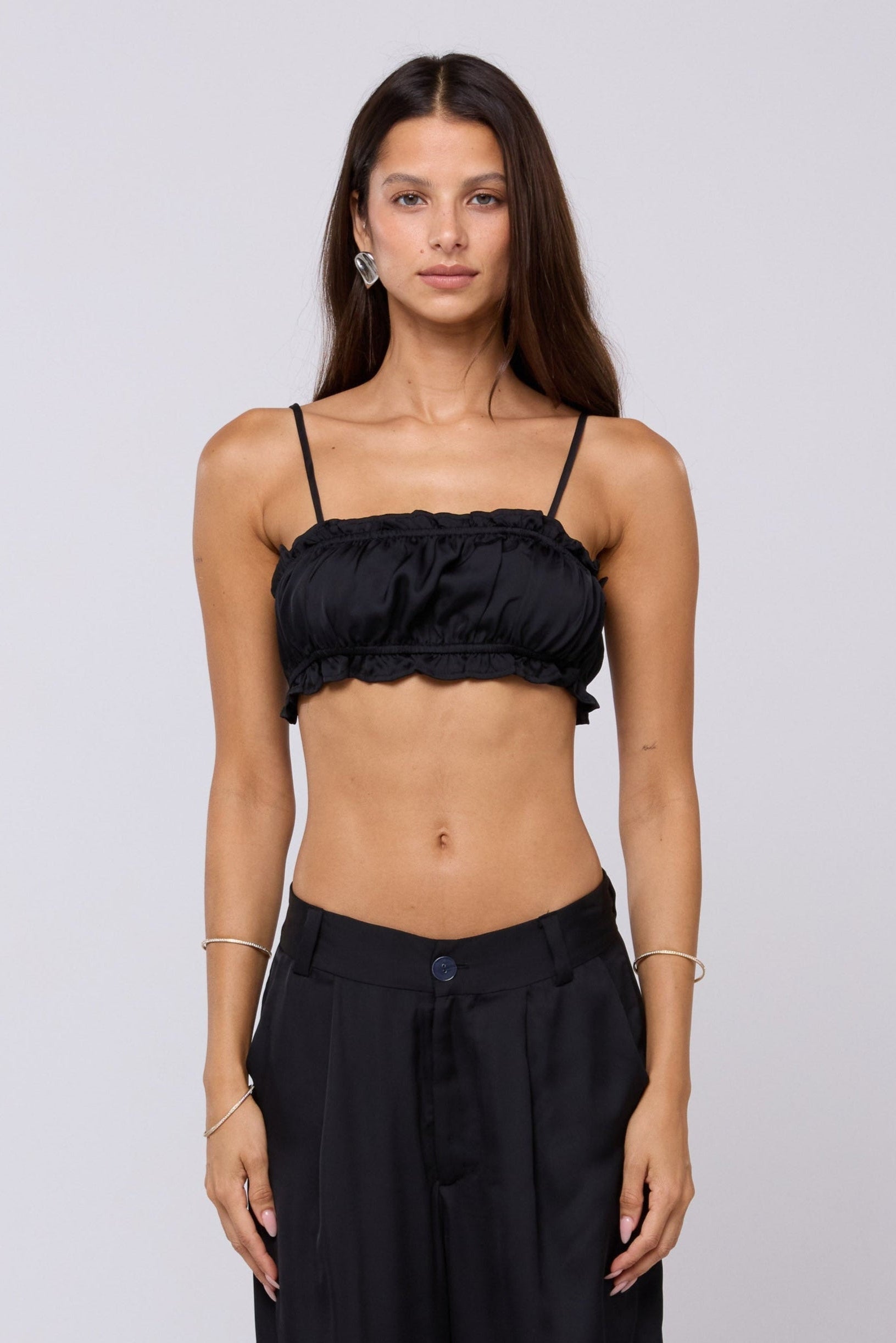 This is an image of Lucy Top in Black - RESA featuring a model wearing the dress