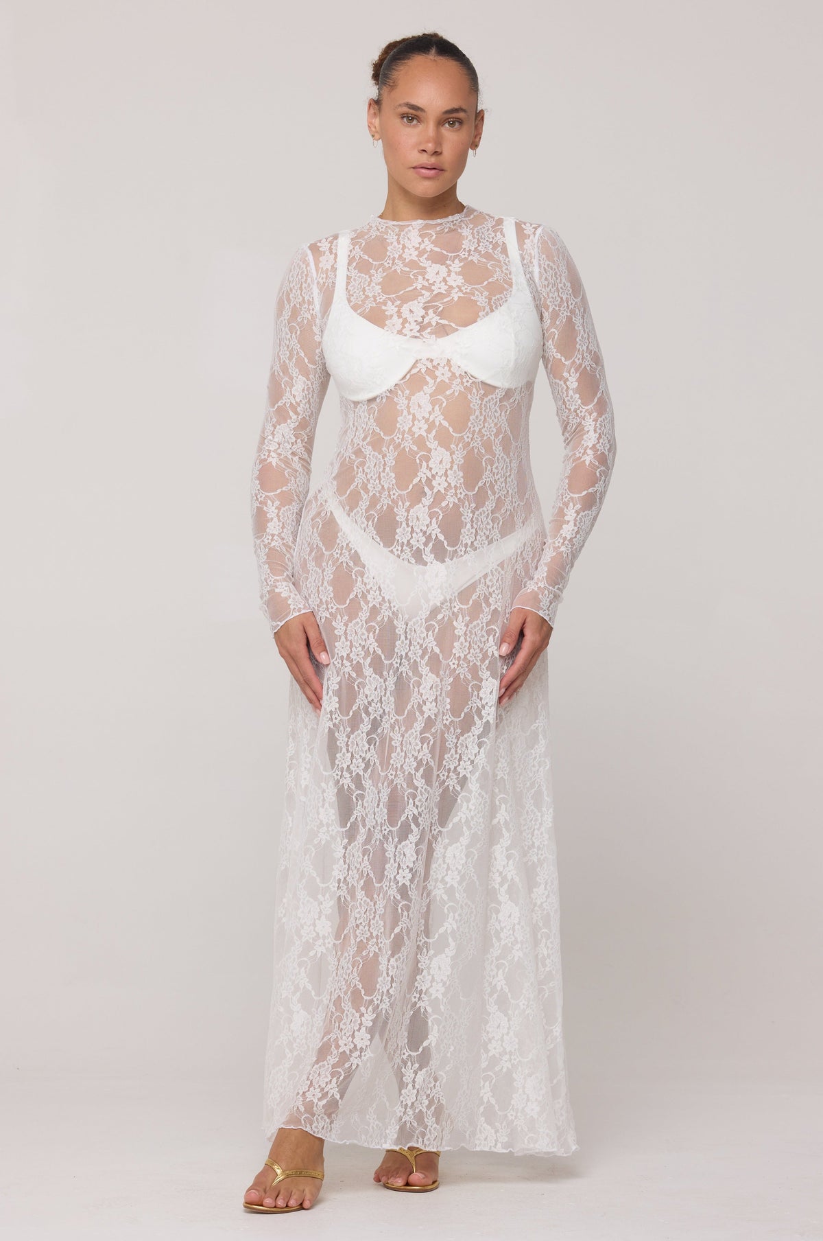 This is an image of Lyon Lace Dress in White Lace - RESA featuring a model wearing the dress