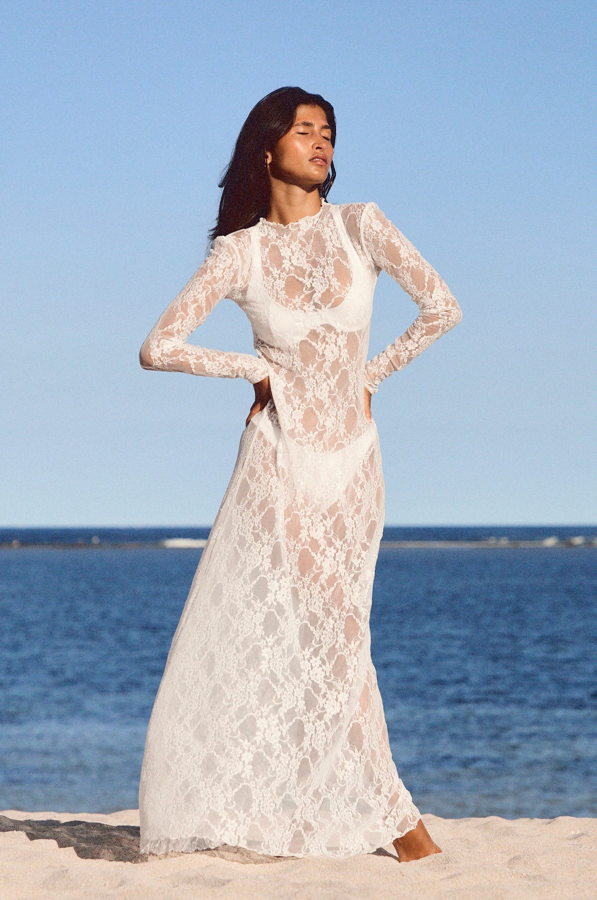 This is an image of Lyon Lace Dress in White Lace - RESA featuring a model wearing the dress