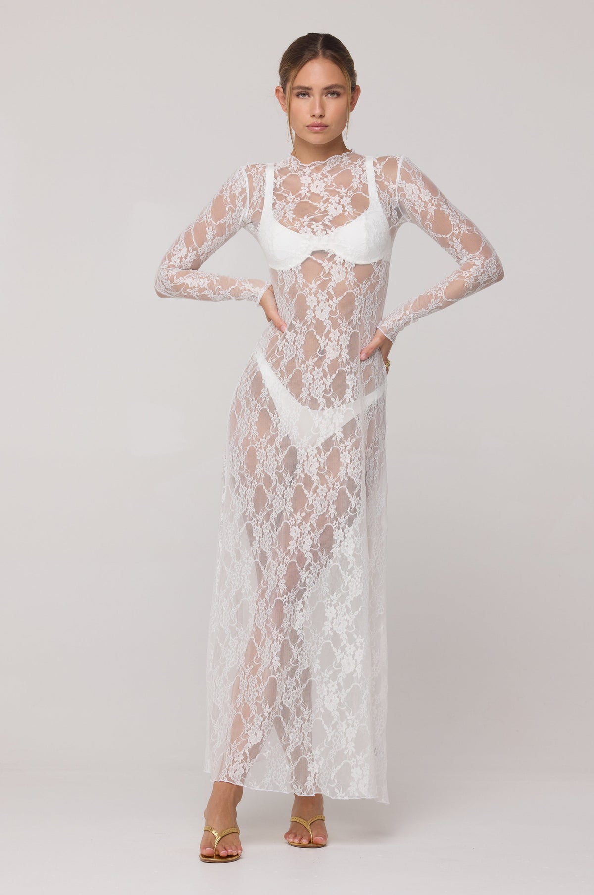 This is an image of Lyon Lace Dress in White Lace - RESA featuring a model wearing the dress