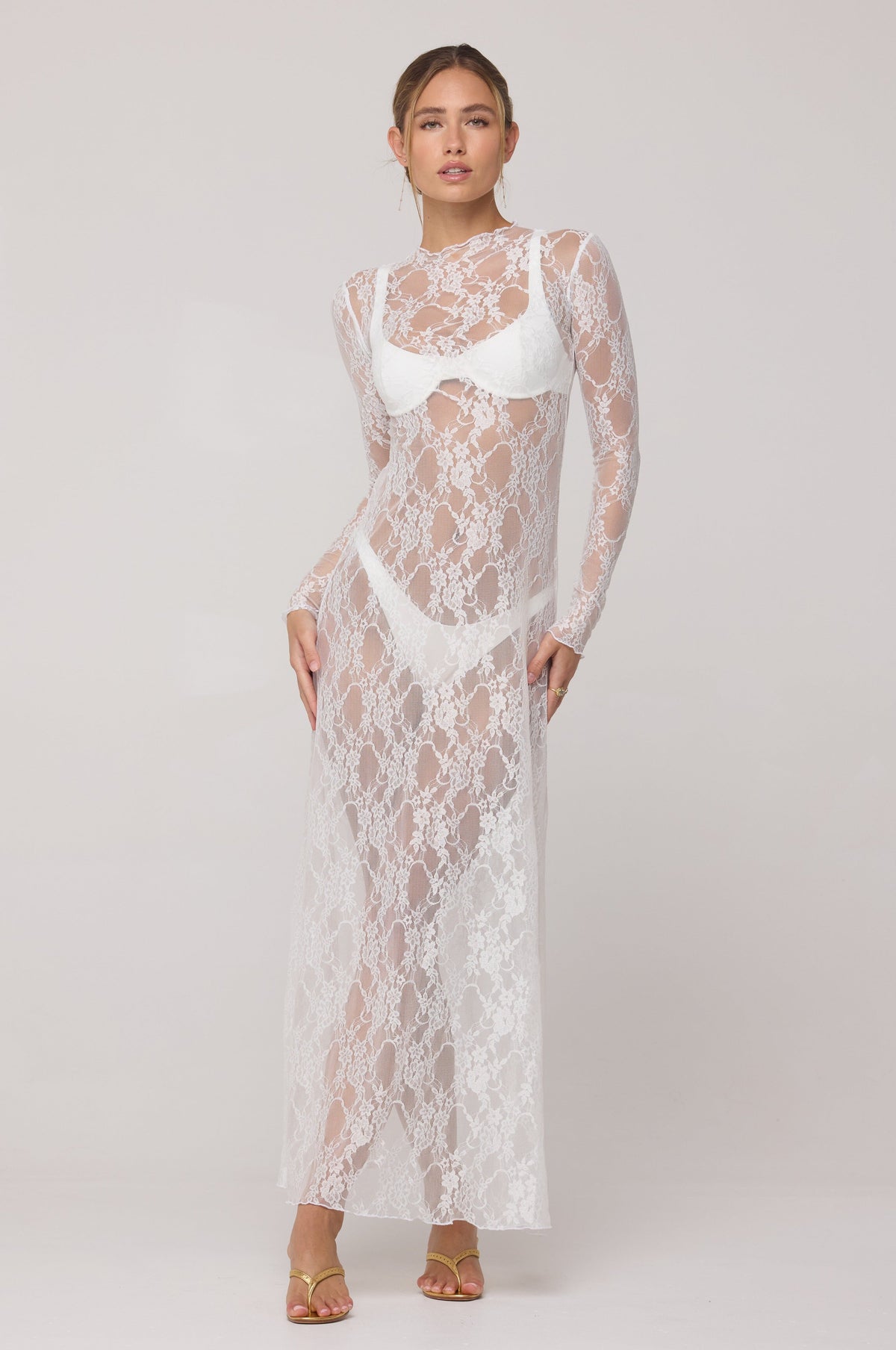 This is an image of Lyon Lace Dress in White Lace - RESA featuring a model wearing the dress
