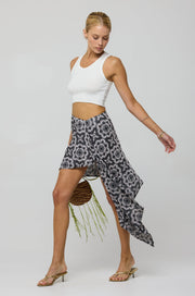 This is an image of Mila Skirt in Bandit - RESA featuring a model wearing the dress
