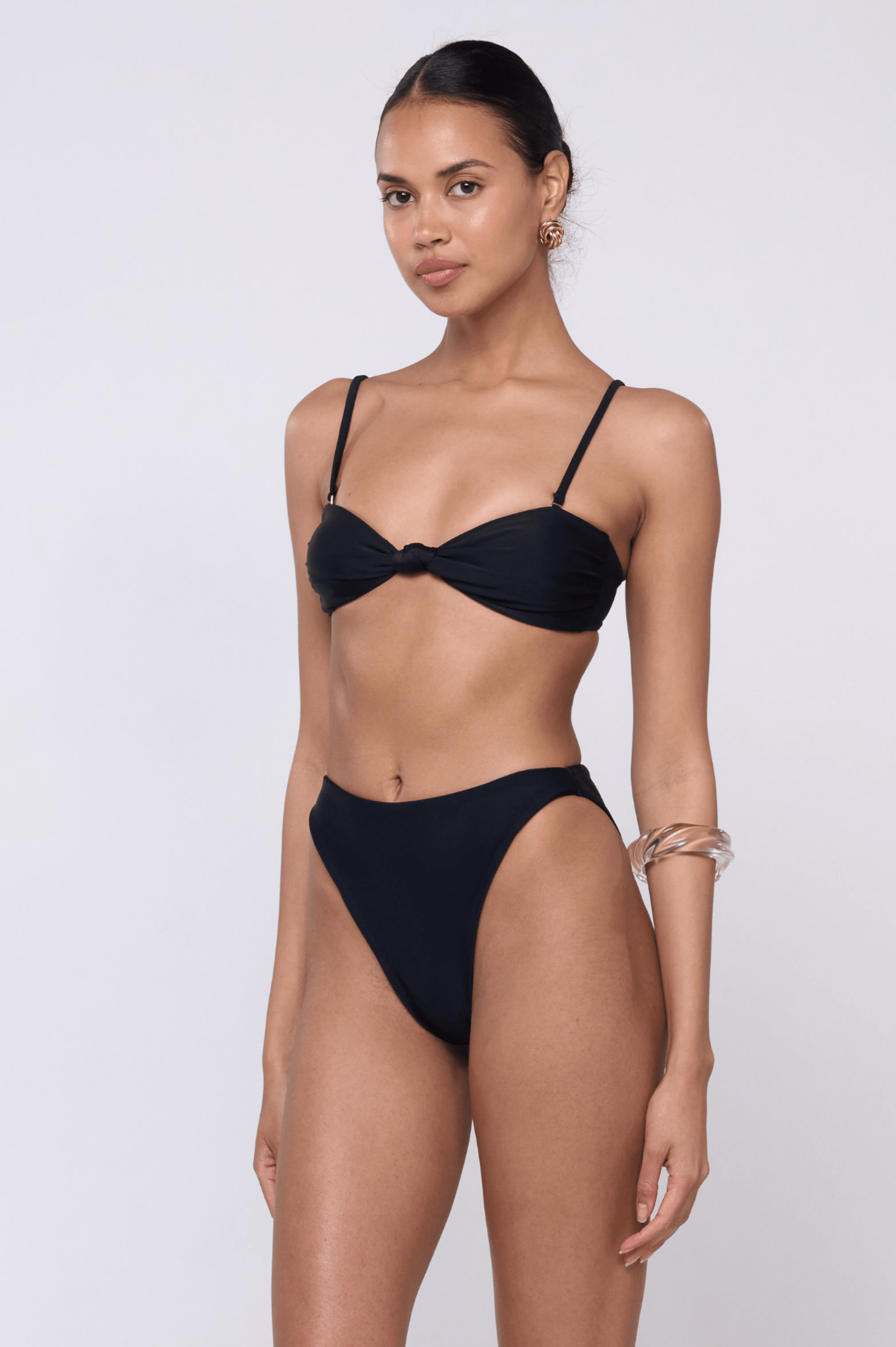 This is an image of Miles Bikini Bottom in Black - RESA featuring a model wearing the dress
