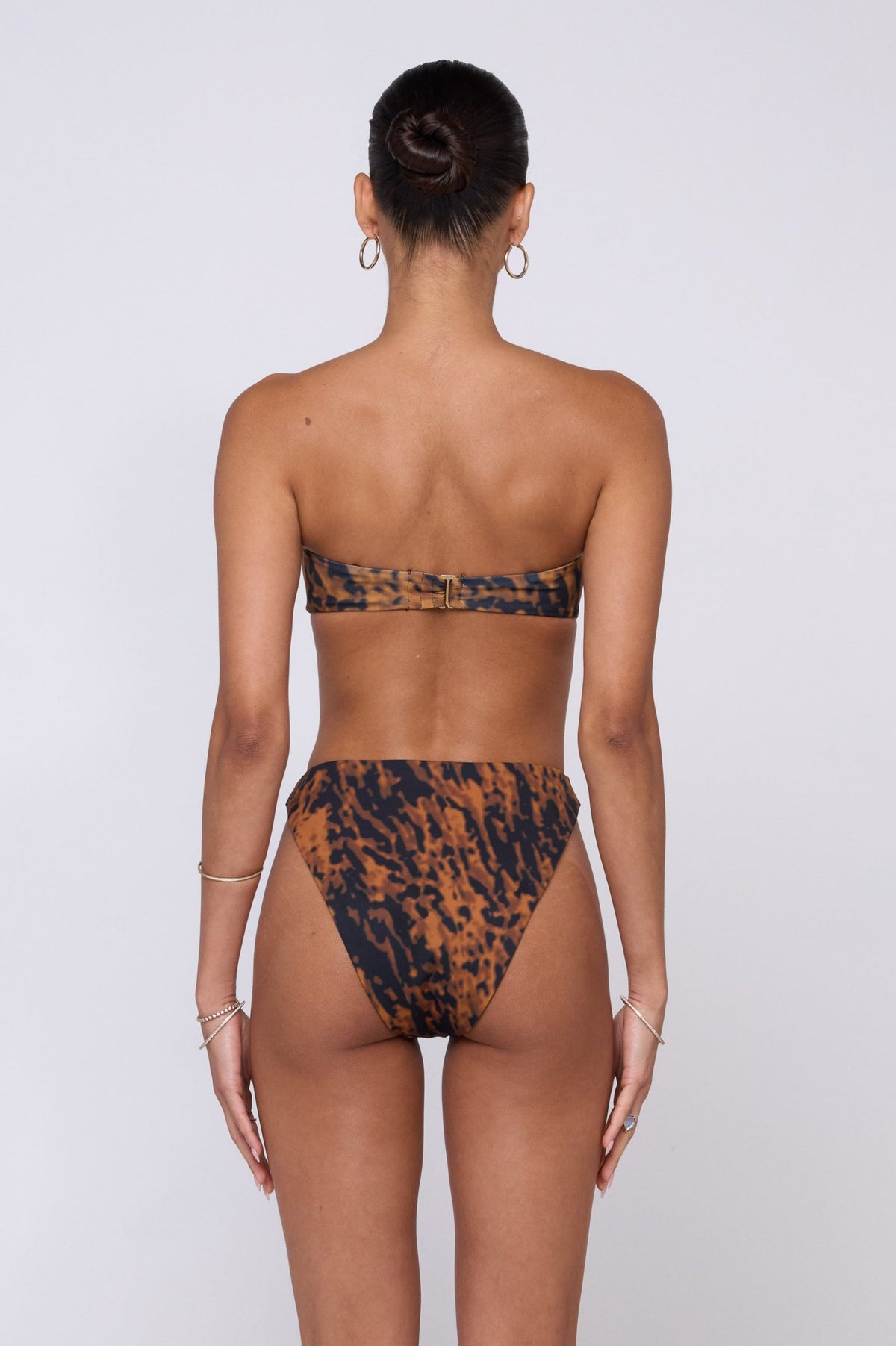 This is an image of Miles Bikini Bottom in Bond - RESA featuring a model wearing the dress