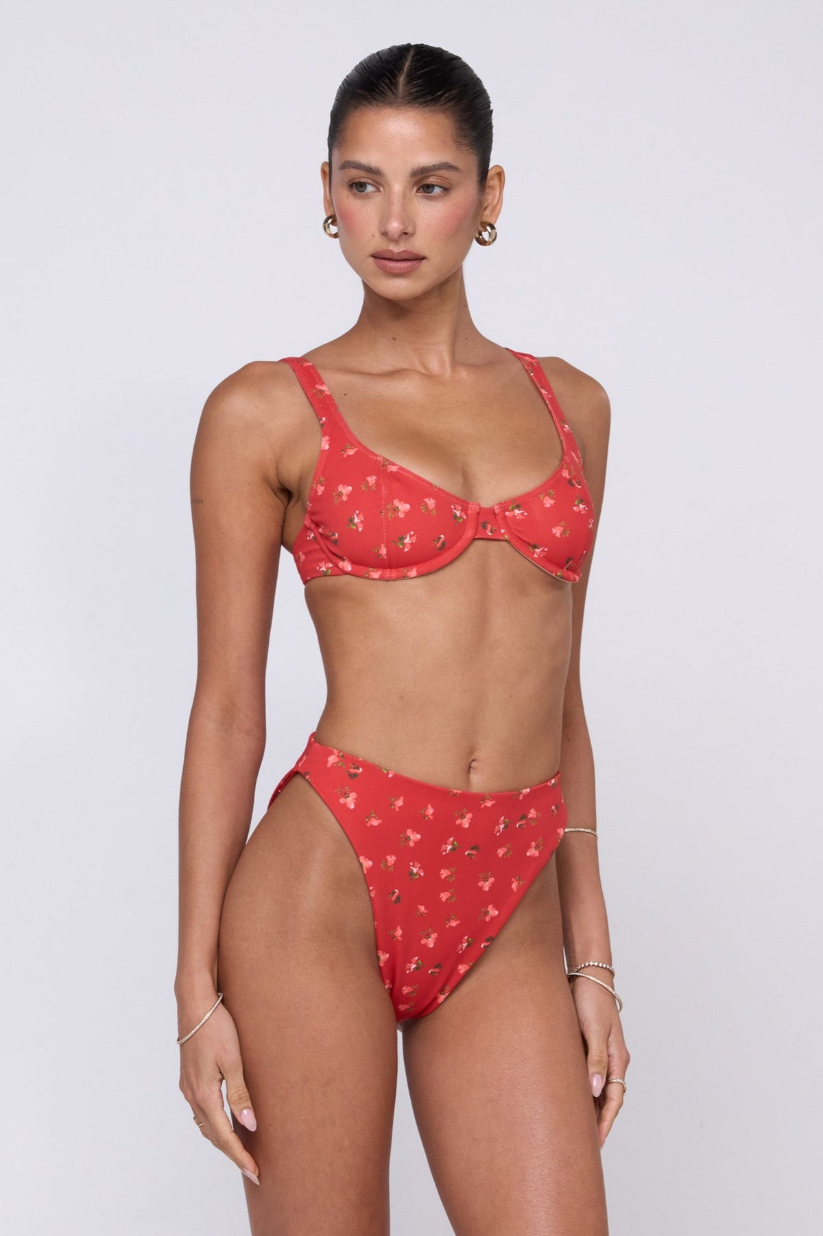 This is an image of Miles Bikini Bottom in Cayenne - RESA featuring a model wearing the dress