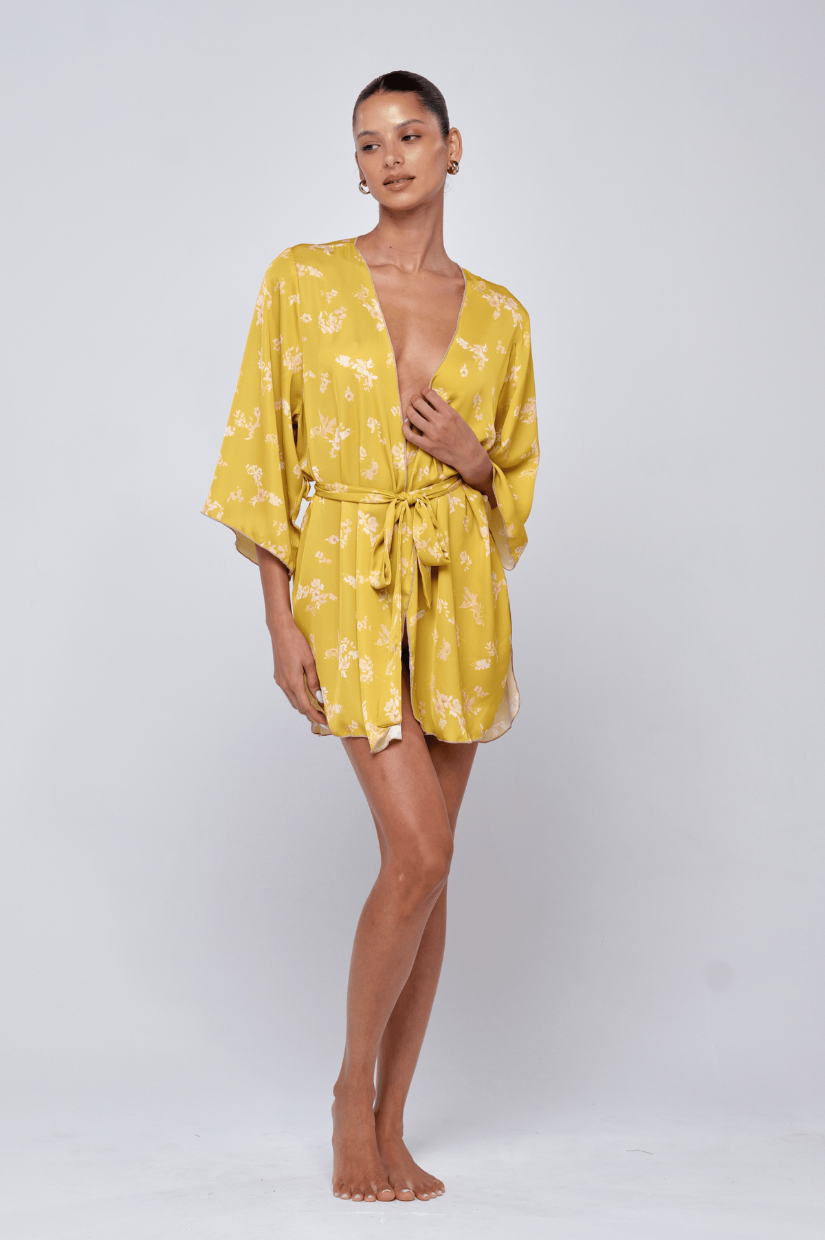 This is an image of Pamela Robe in Citrus - RESA featuring a model wearing the dress