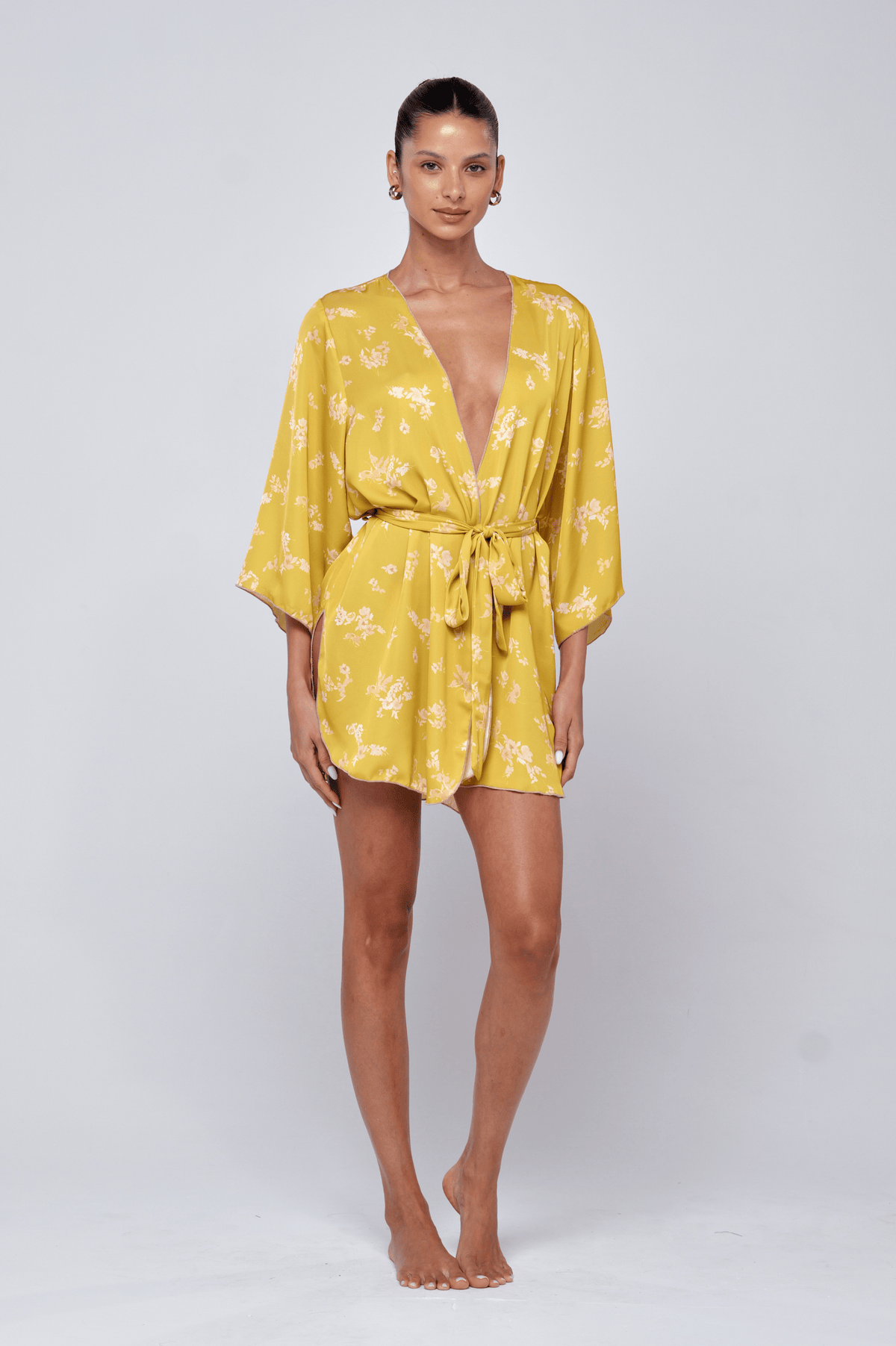 This is an image of Pamela Robe in Citrus - RESA featuring a model wearing the dress