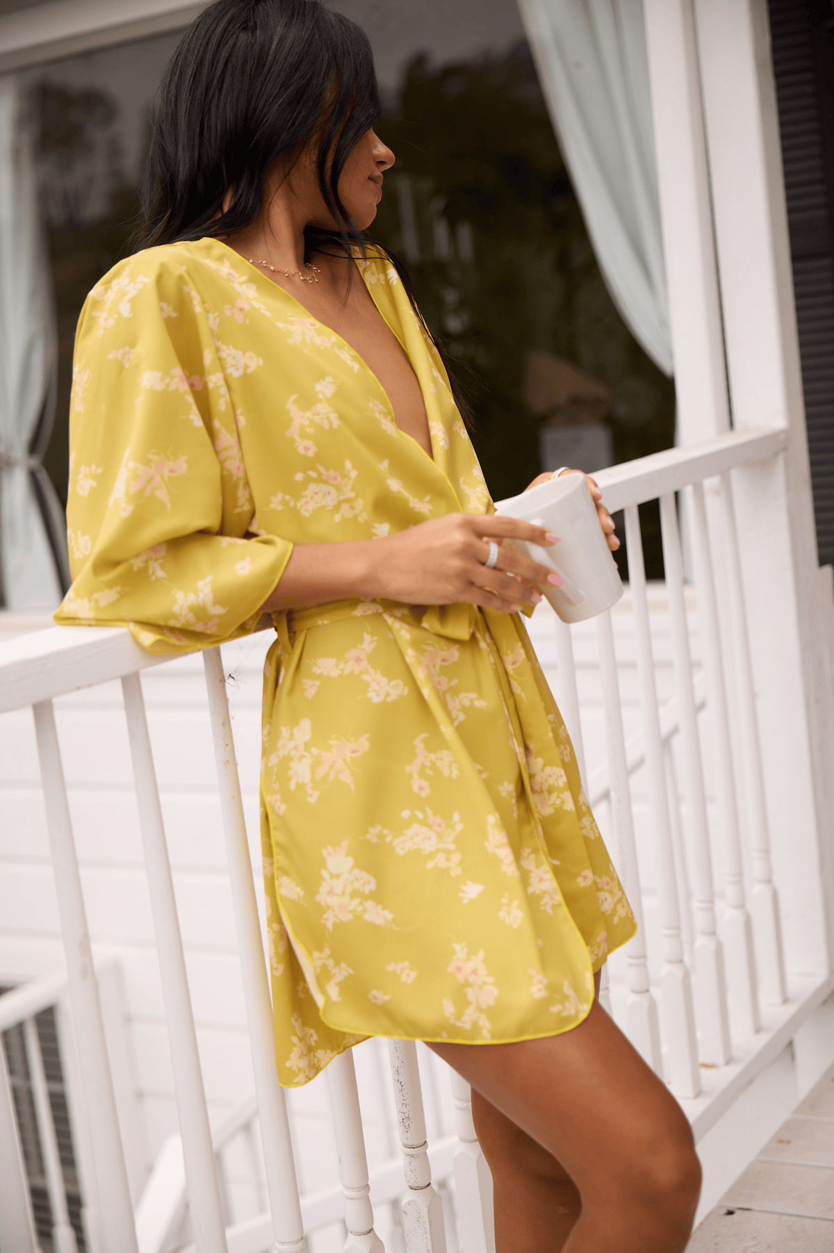 This is an image of Pamela Robe in Citrus - RESA featuring a model wearing the dress