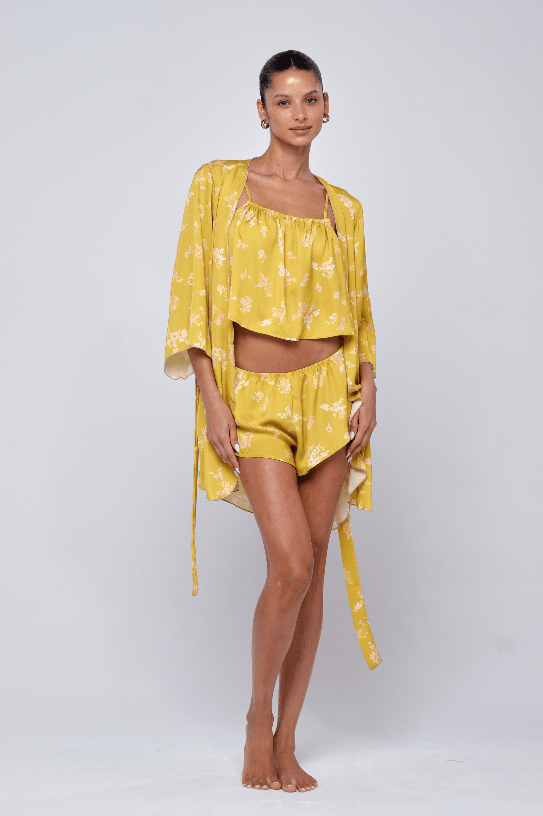 This is an image of Pamela Robe in Citrus - RESA featuring a model wearing the dress