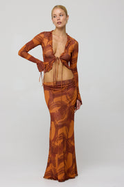 This is an image of Tezza Top in Flame - RESA featuring a model wearing the dress