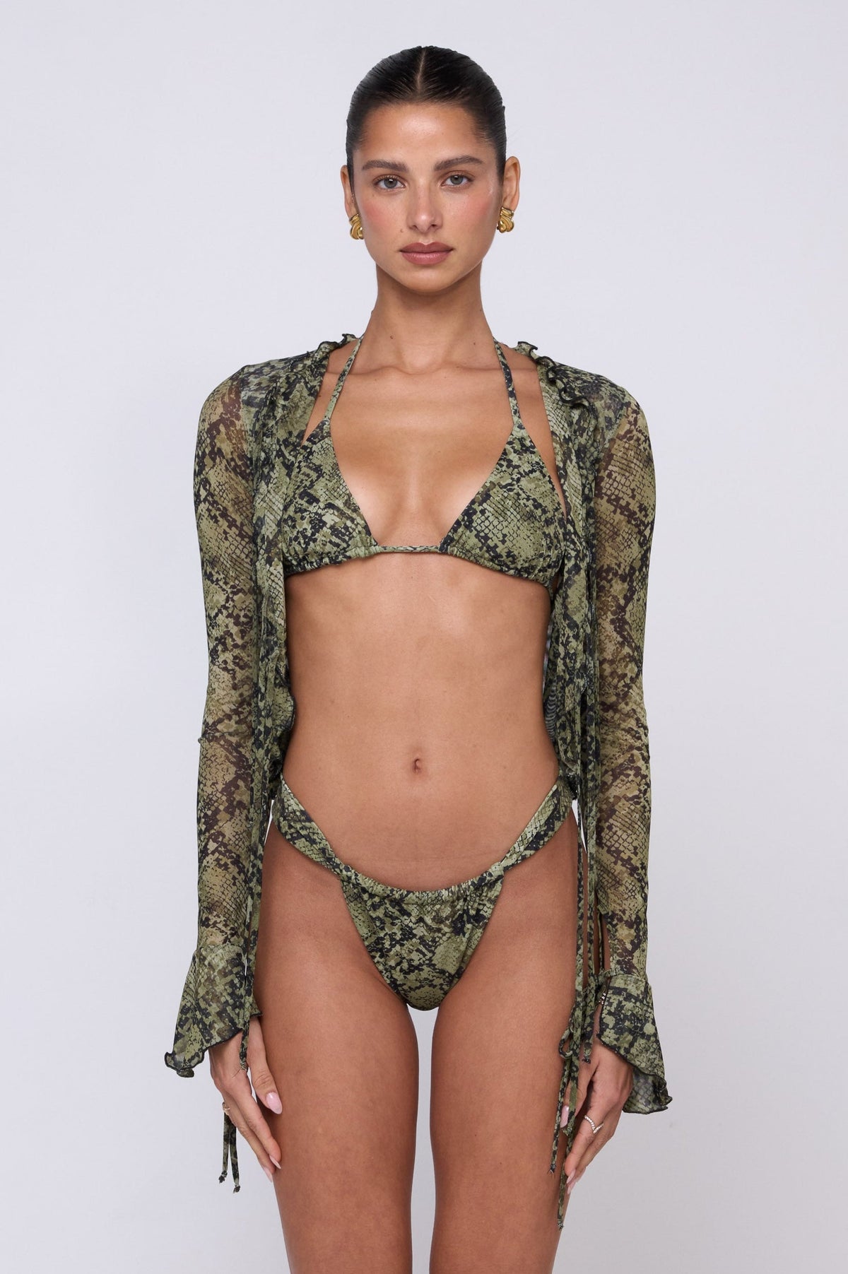 This is an image of Tezza Top in Venom - RESA featuring a model wearing the dress