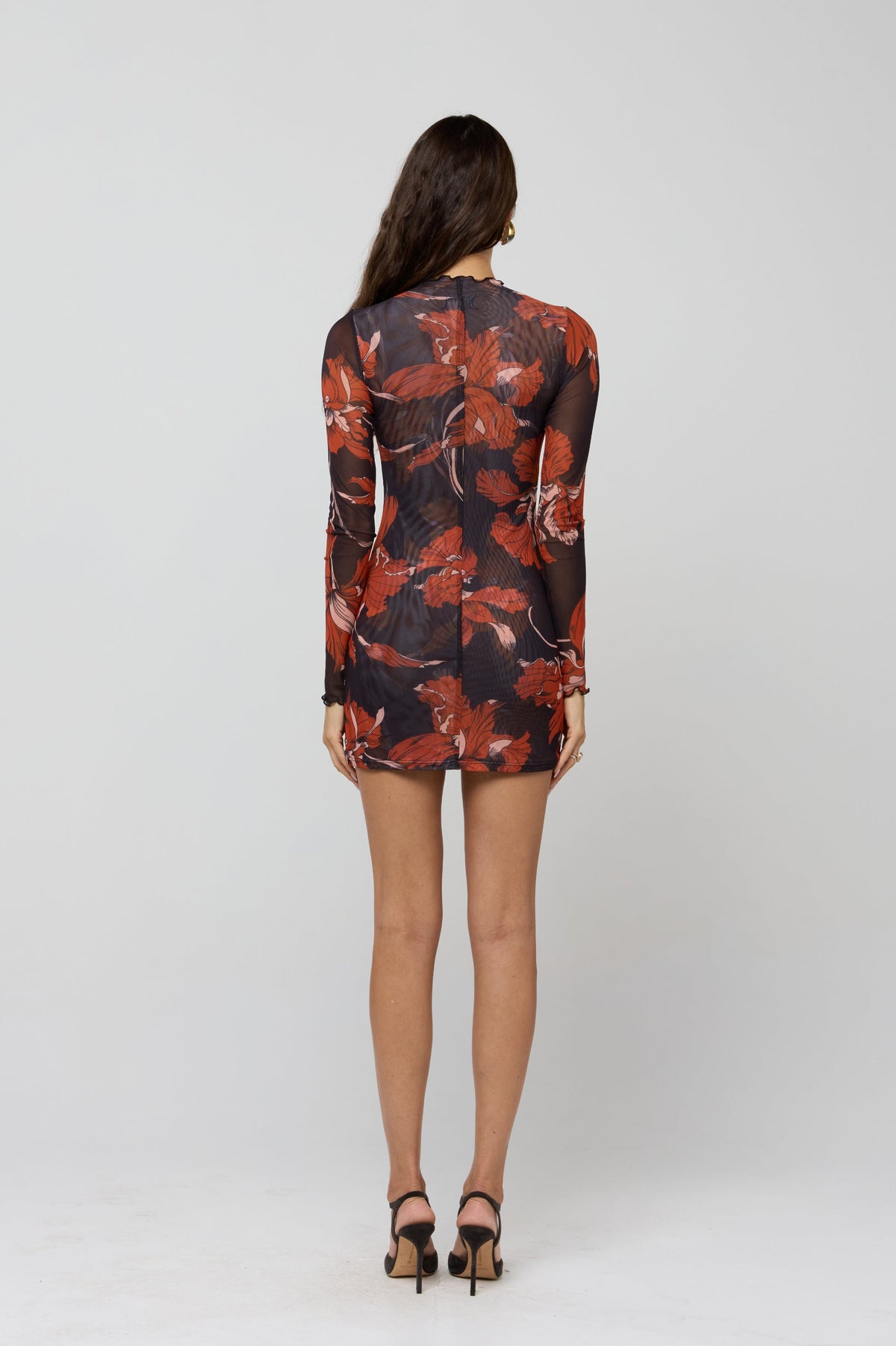 This is an image of Tyler Mini in Coeur - RESA featuring a model wearing the dress