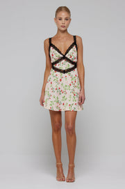 This is an image of Amelia Mini in Cherie - RESA featuring a model wearing the dress