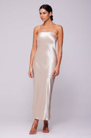 This is an image of Anna Slip in Champagne - RESA featuring a model wearing the dress