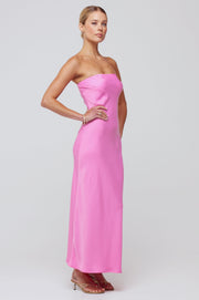 This is an image of Anna Slip in in Dragon Fruit - RESA featuring a model wearing the dress