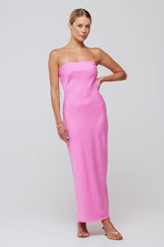 This is an image of Anna Slip in in Dragon Fruit - RESA featuring a model wearing the dress