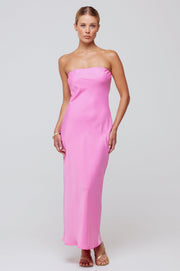 This is an image of Anna Slip in in Dragon Fruit - RESA featuring a model wearing the dress