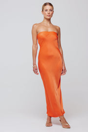 This is an image of Anna Slip in Papaya - RESA featuring a model wearing the dress