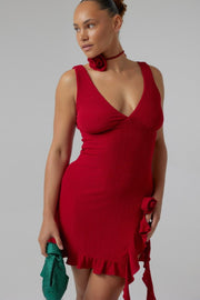 This is an image of Anyssa Mini in Ruby - RESA featuring a model wearing the dress